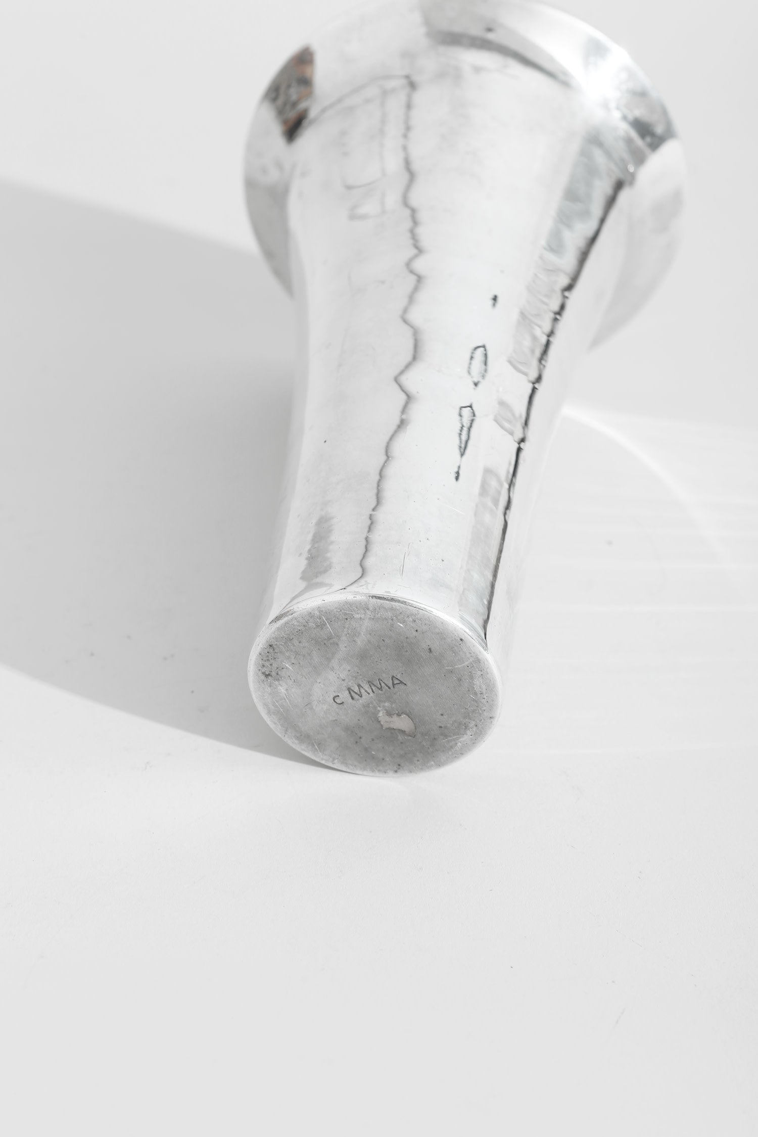 Bauhaus Chrome Vase — side angle showing reflective chrome surface