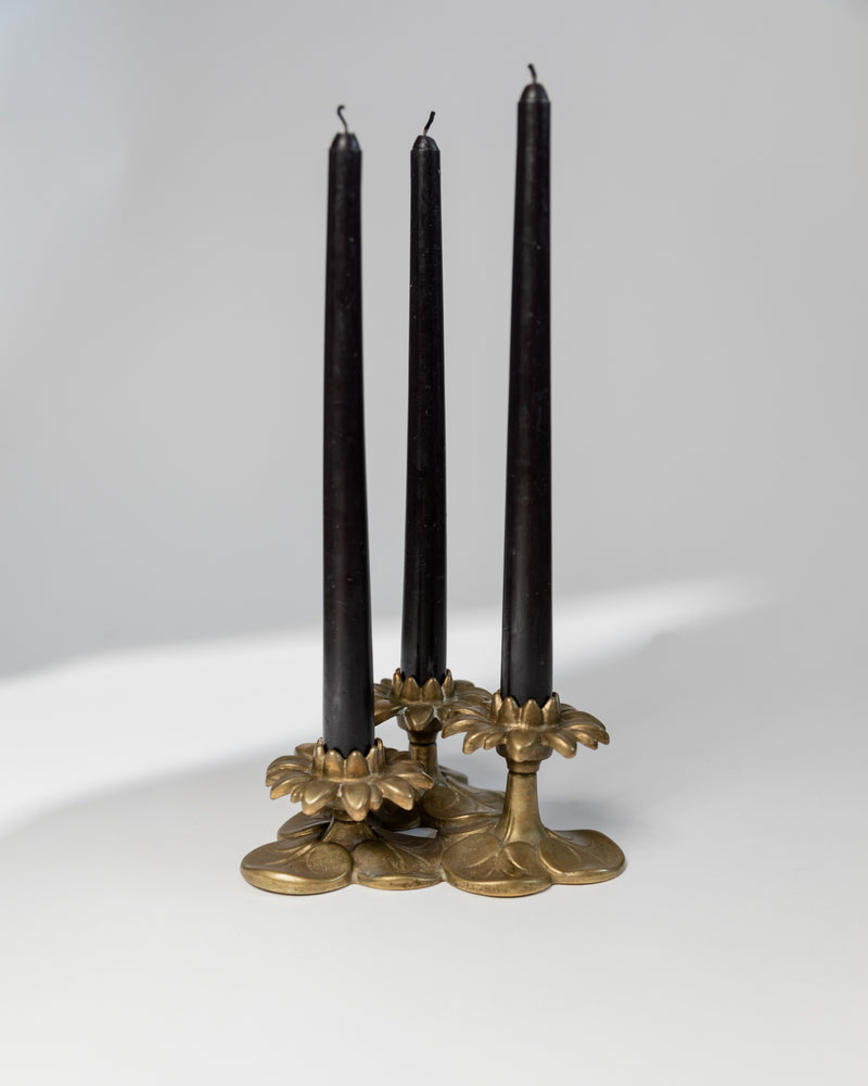 Brass floral candlesticks with black tapered candles 1930s