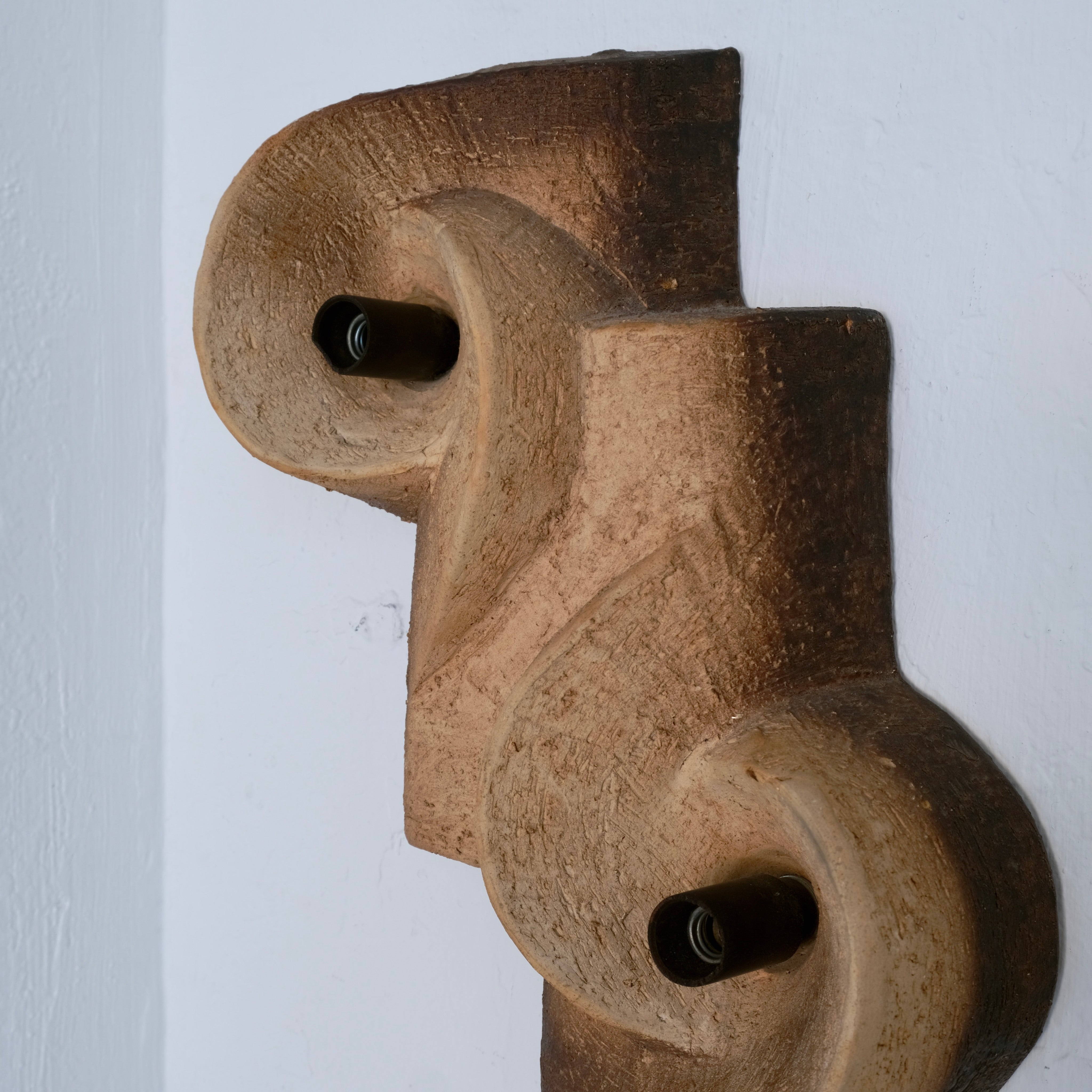Brutalist Ceramic Wall Sconce, Netherlands, 1960s — angled view highlighting textured ceramic surface