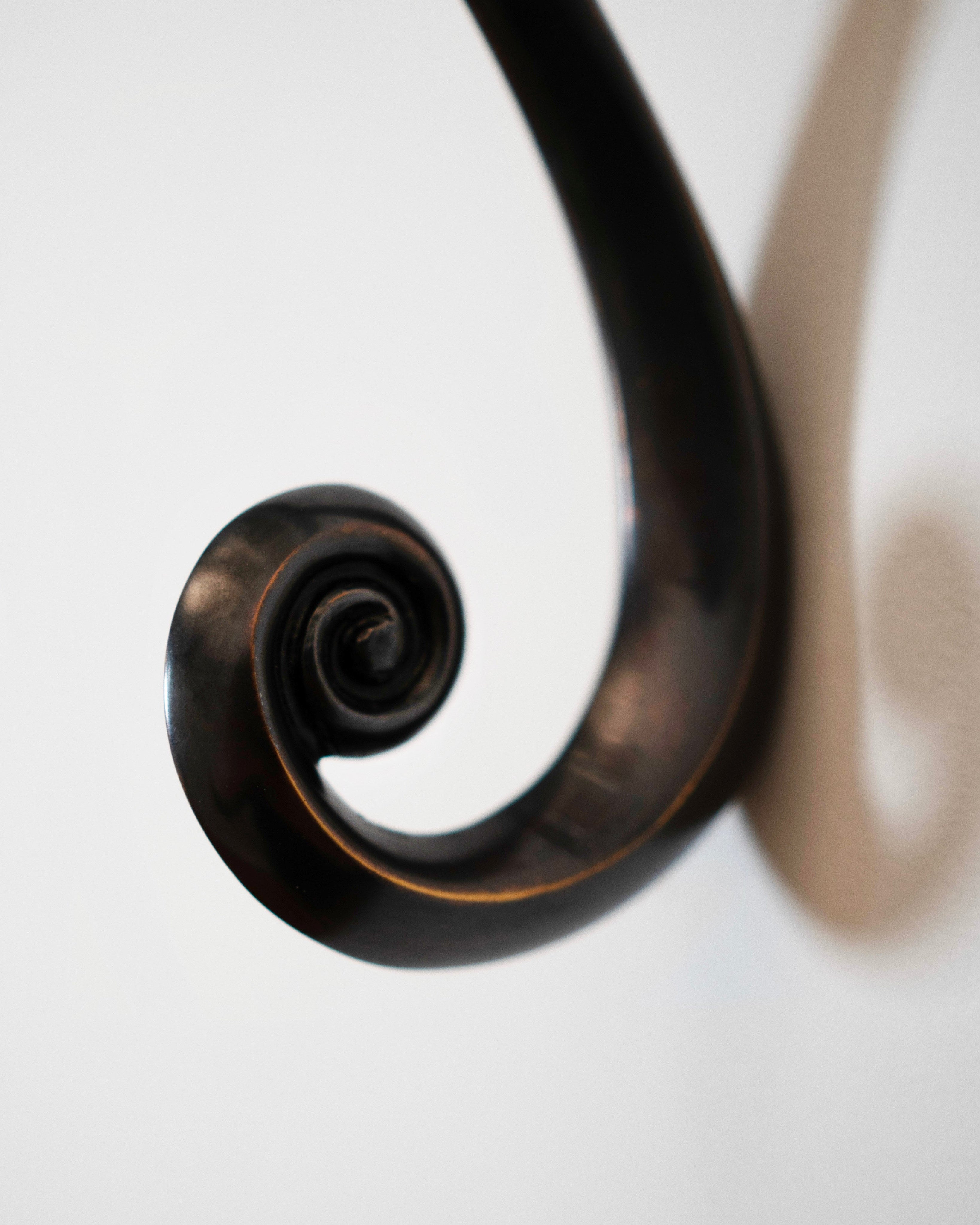 Noelle Hook - Antique Brass — close-up of spiral design detail