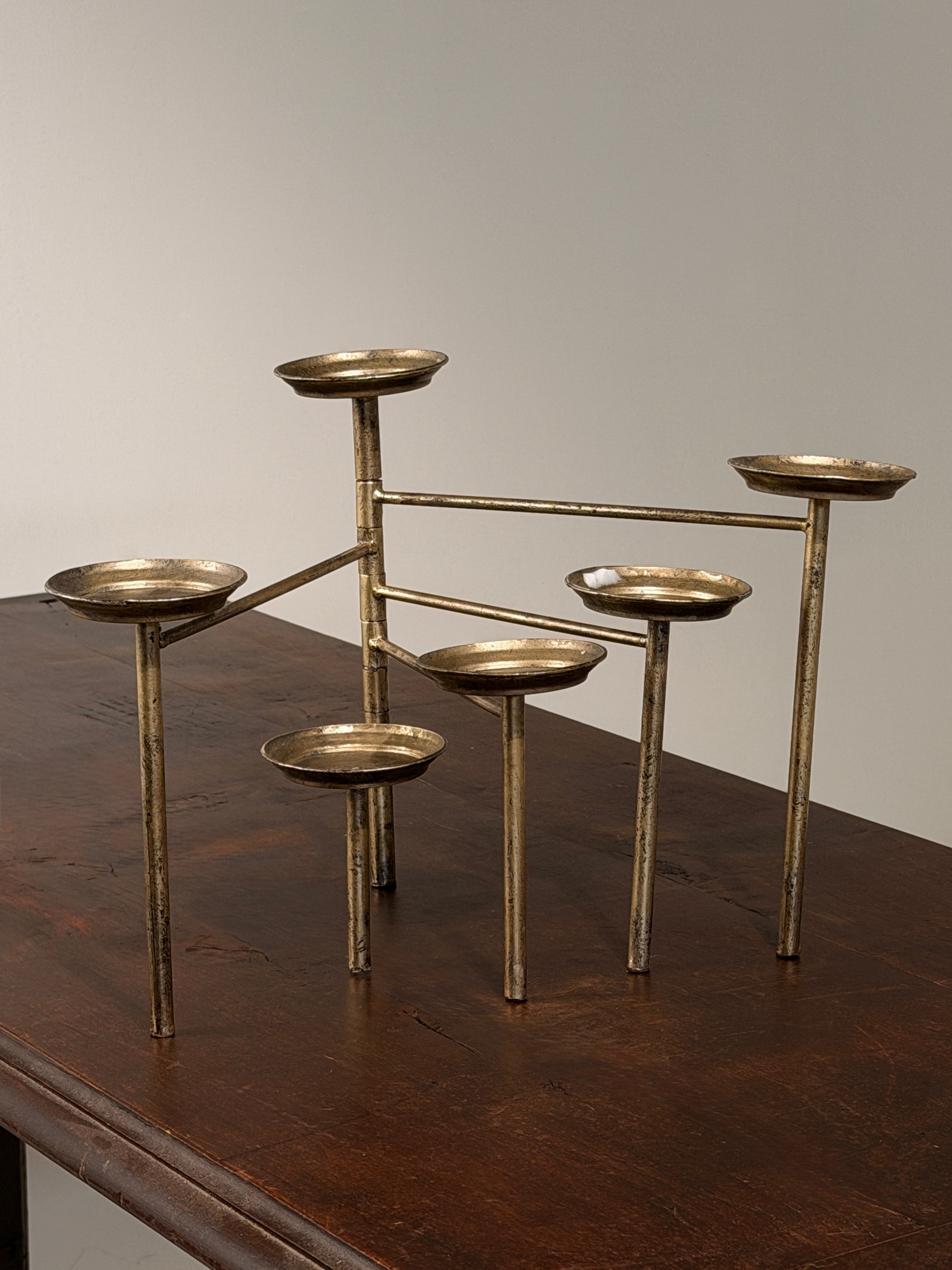 Articulated six-arm candelabra in silver-plated metal, France, circa 1950 — lifestyle setting