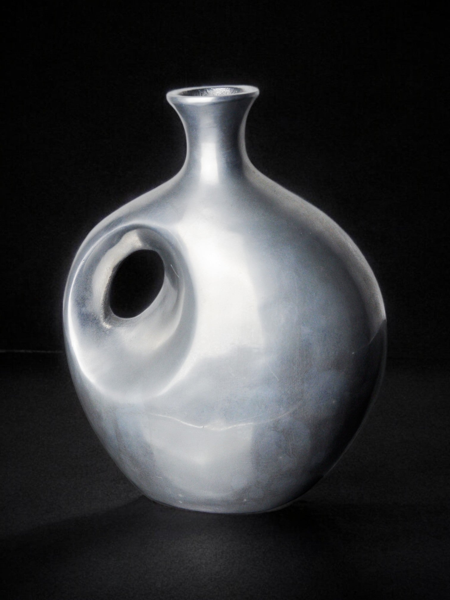 Biomorphic Base by Art3, Spain, 1980s — side angle of polished ceramic vase