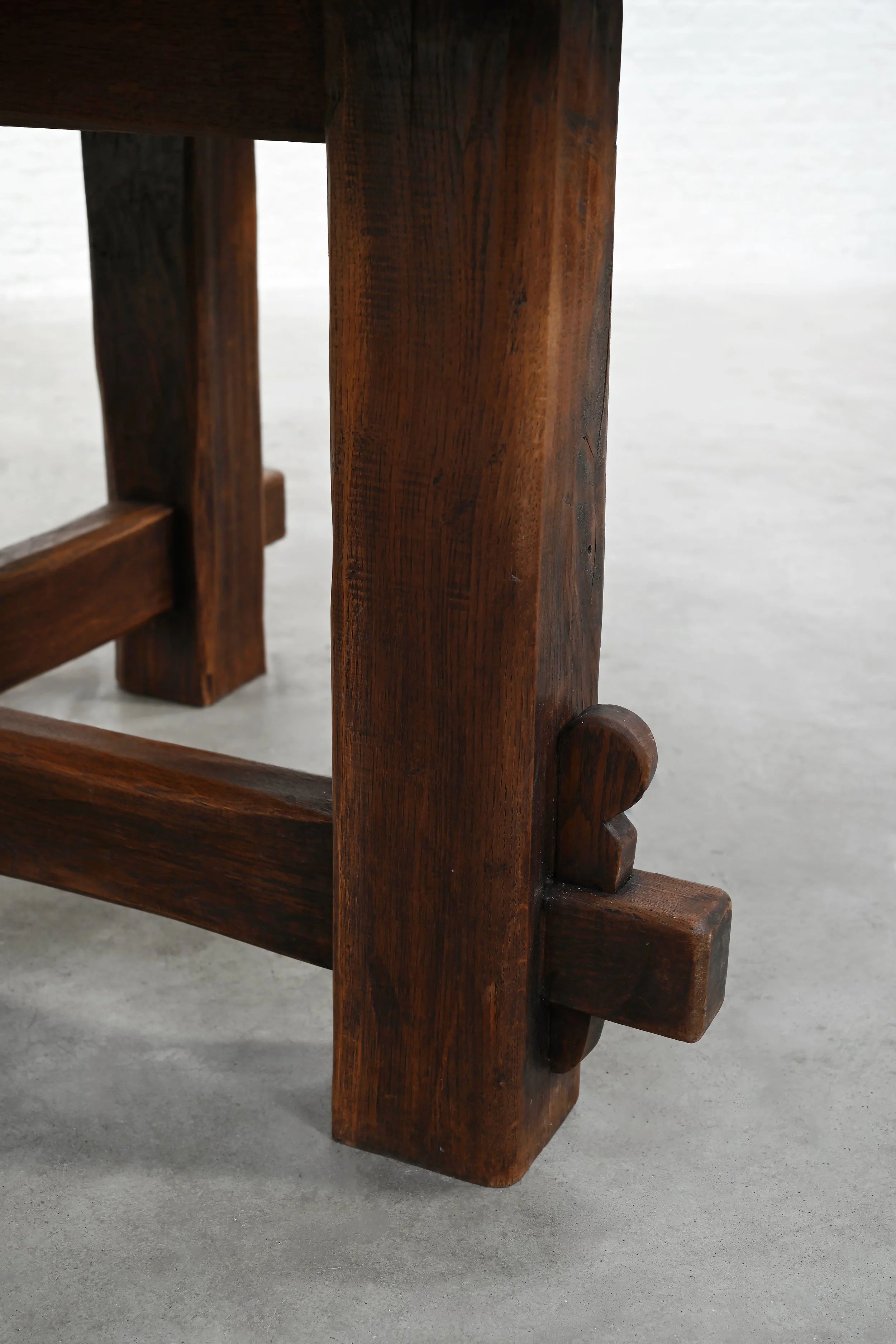 Rustic Wooden Dining Table, France 1920s — back view highlighting sturdy wooden legs