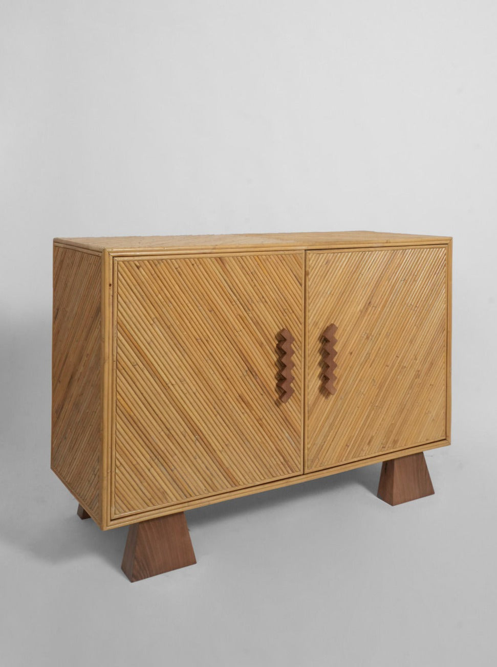 Arrabida Rattan and Walnut Sideboard — side angle showing diagonal rattan pattern