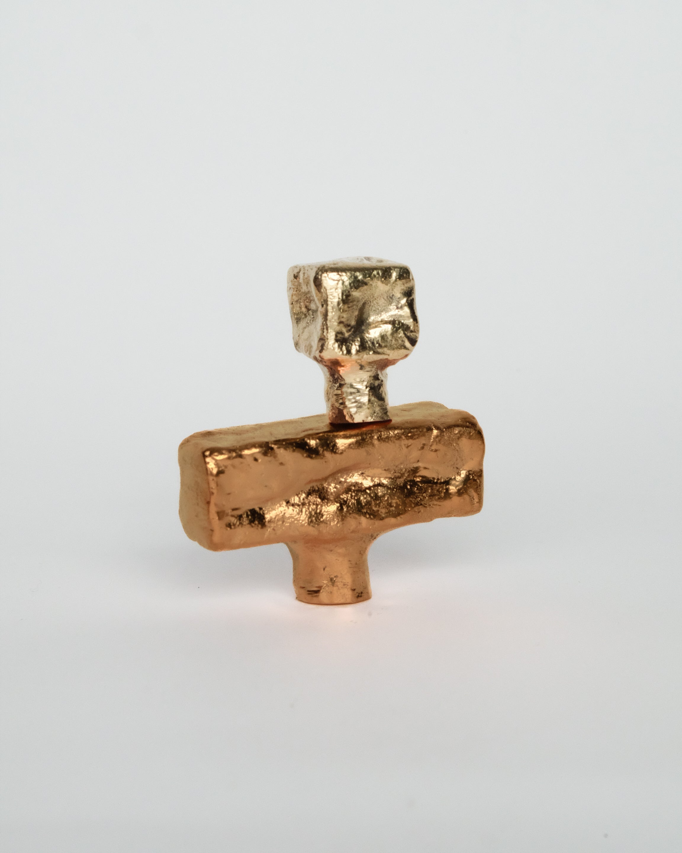 ISLE Cabinet Knob/Wall Hook Small — front view of gold-toned metal design