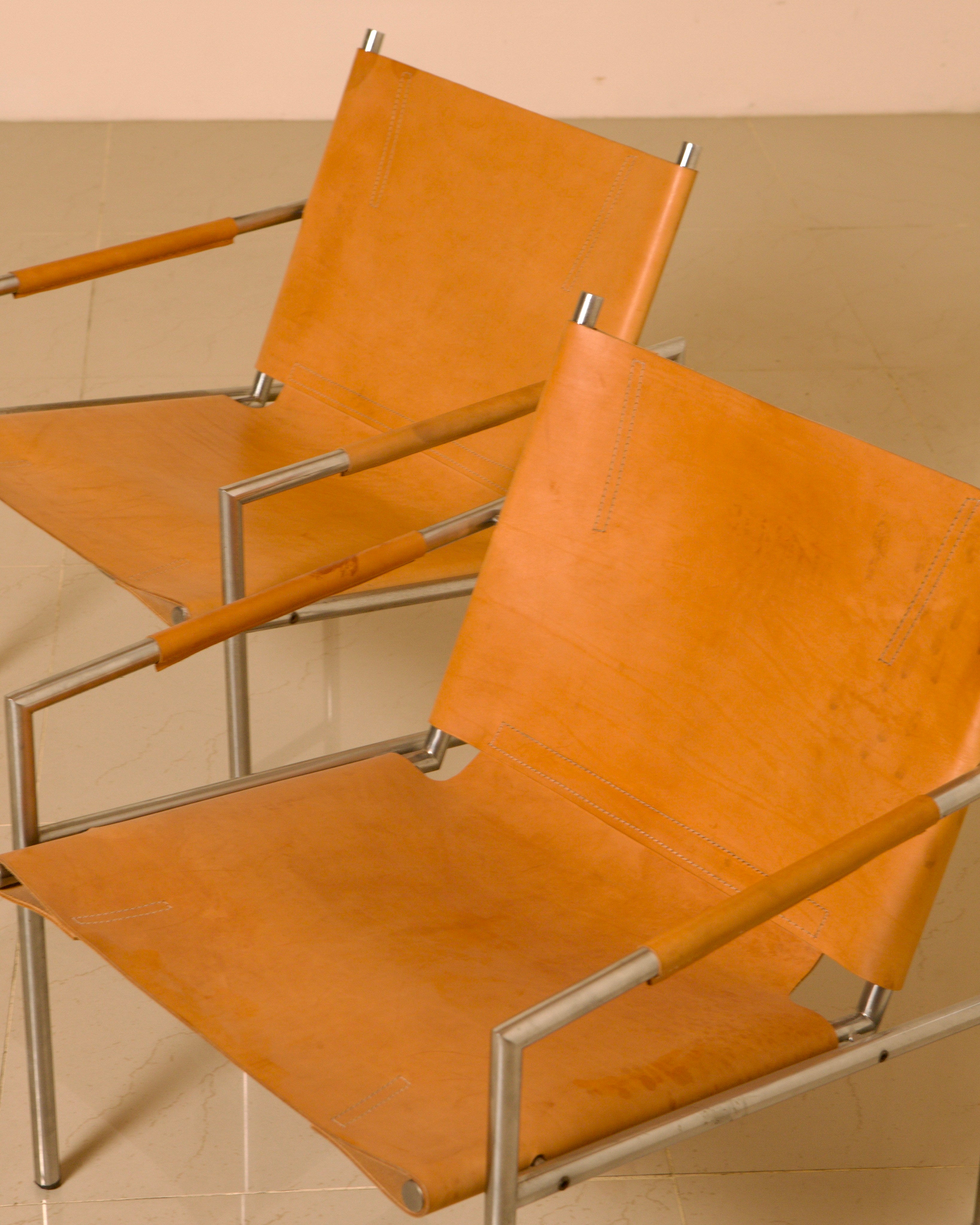 Pair of "SZ02" armchairs in natural beige leather by Martin Visser for Spectrum 60's — lifestyle setting