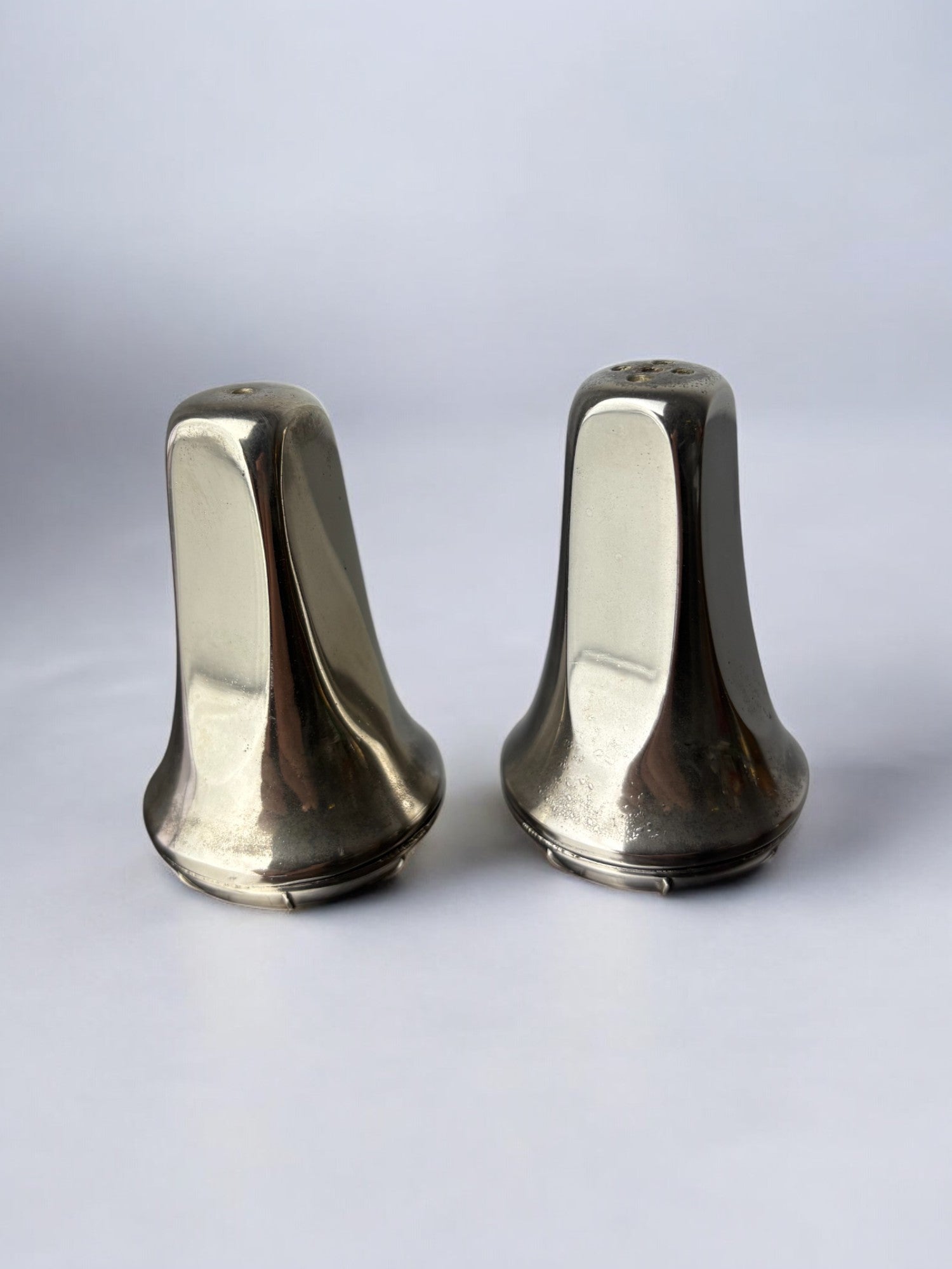Faceted Salt & Pepper Shakers, Italy, 1970s — side angle showing reflective metal surface