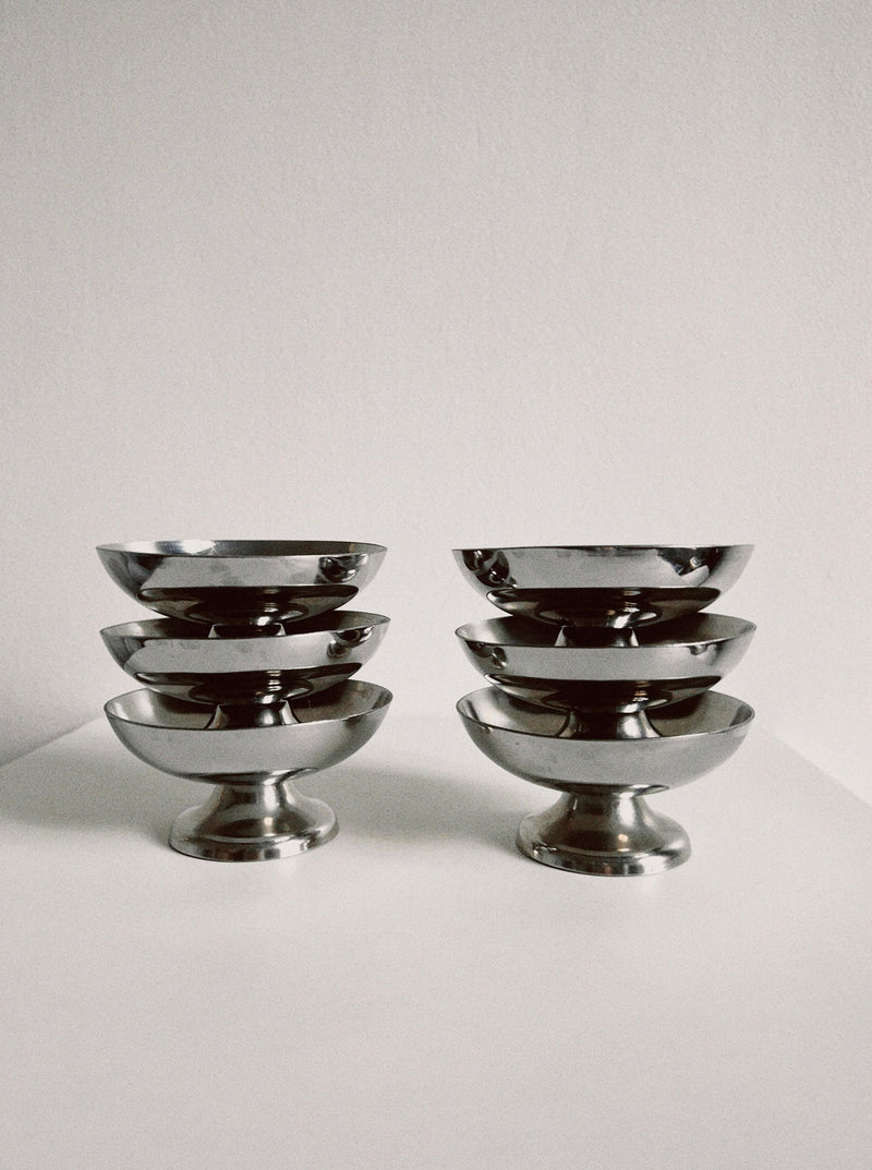 Set of six polished stainless steel ice cream coupes on pedestals