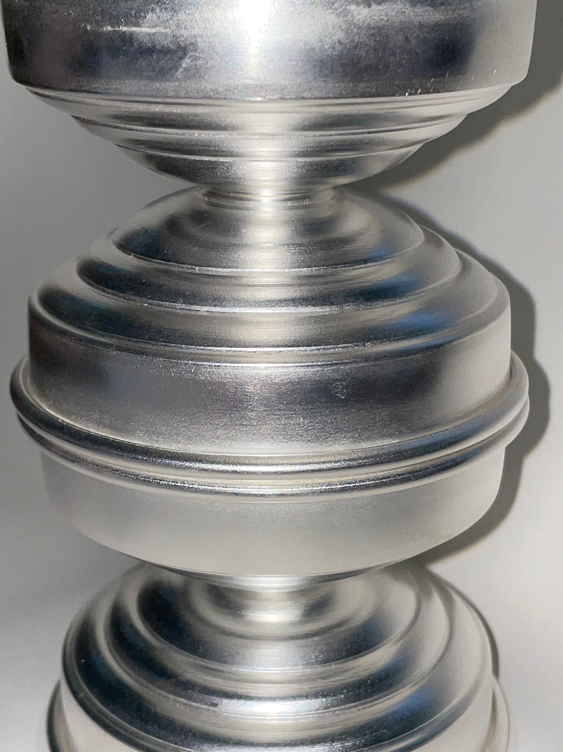 Silver Plated Candle Holders in Brass — close-up of textured silver surface