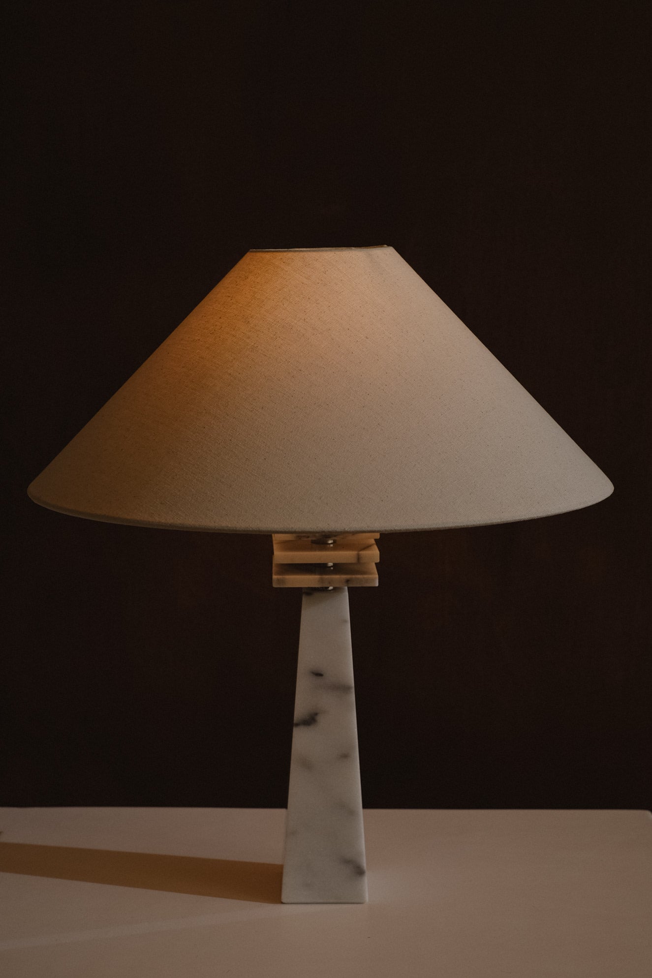 Marble Table Lamp — close-up of white marble base and fabric shade