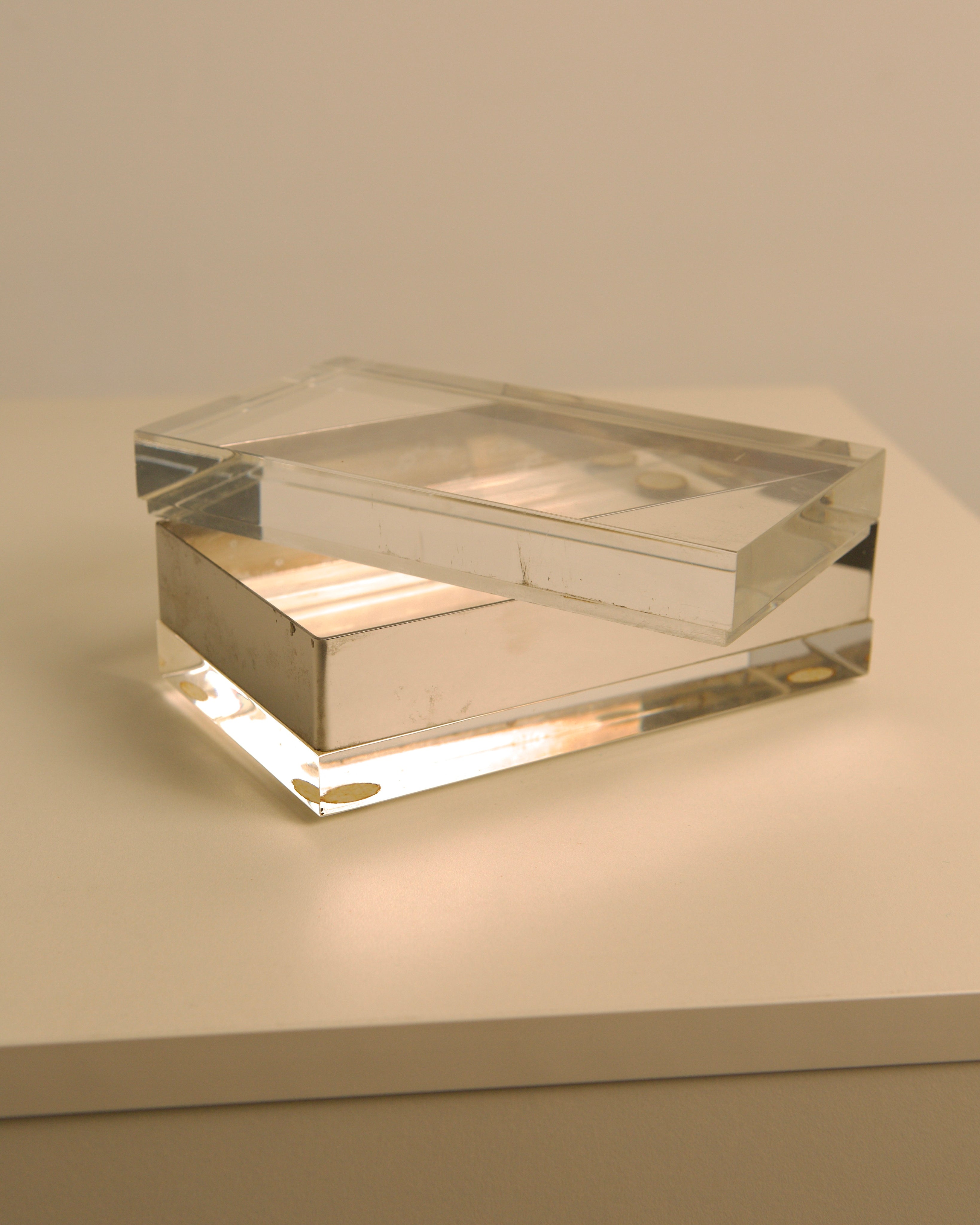 Large clear acrylic Italian storage box from 1970s showing transparency