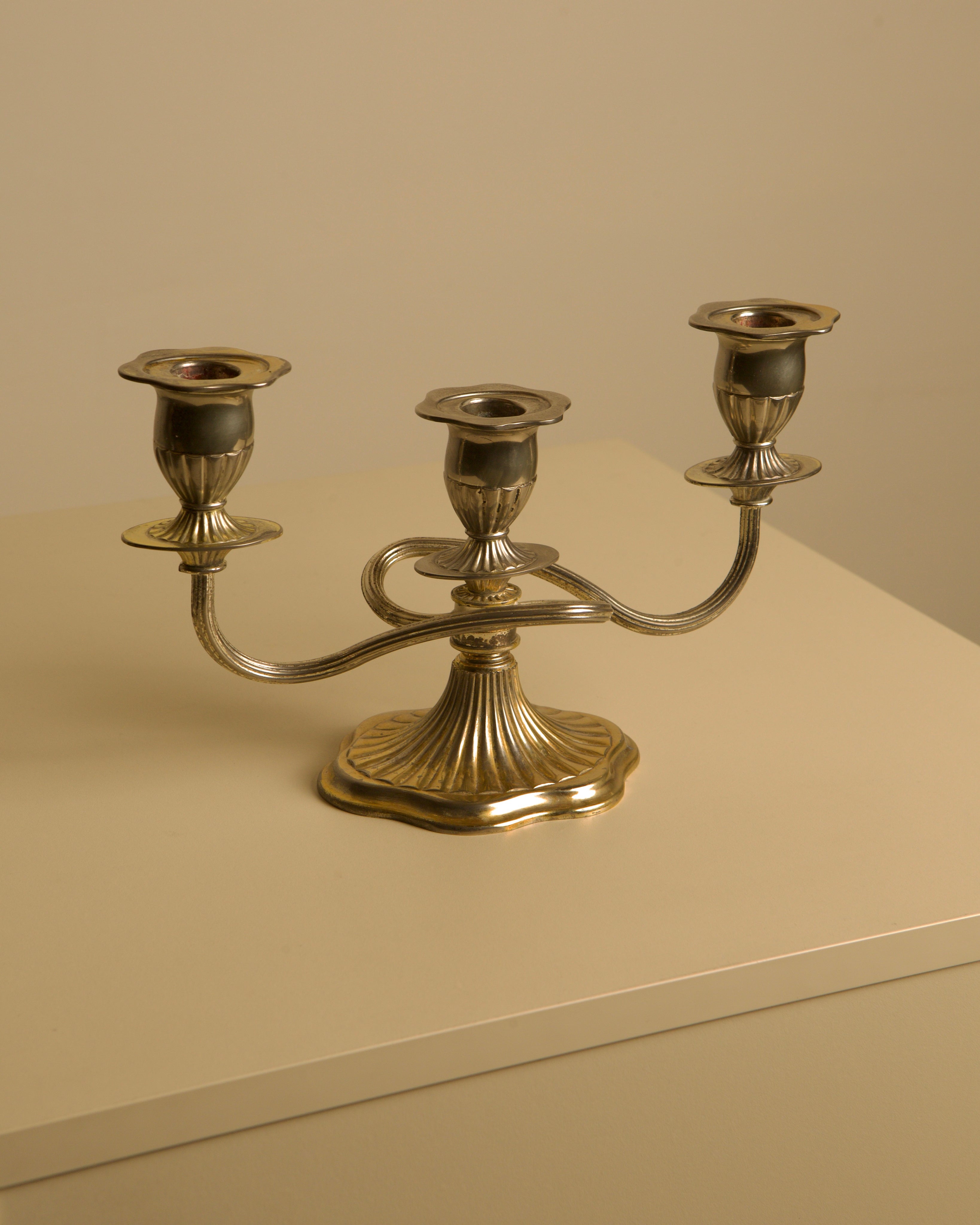 Italian "Medusa" Metal Candleholders, 1960s — side angle on neutral background