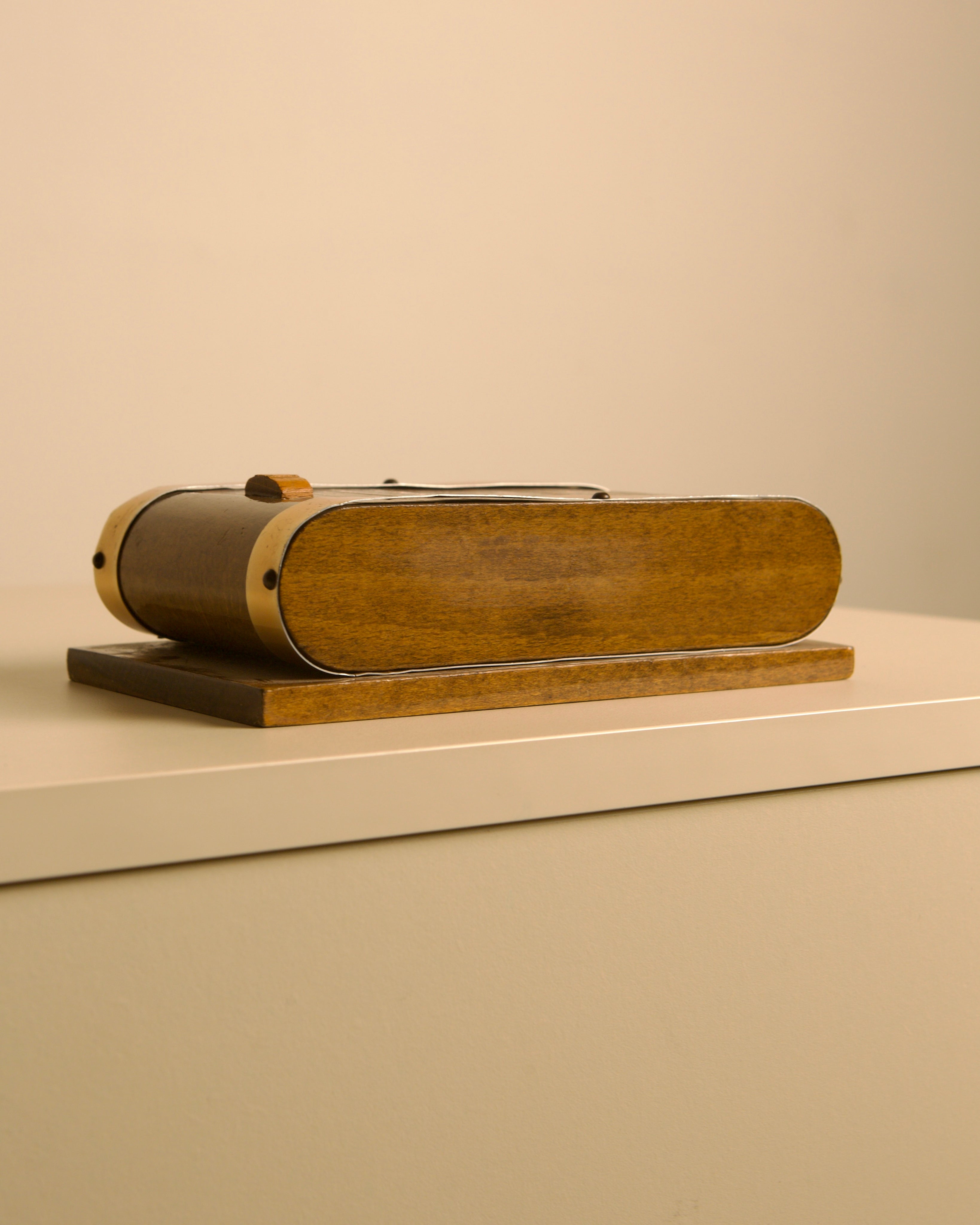 Italian Sliding Wood and Brass Box, 40s — side angle showing wooden base and brass accents