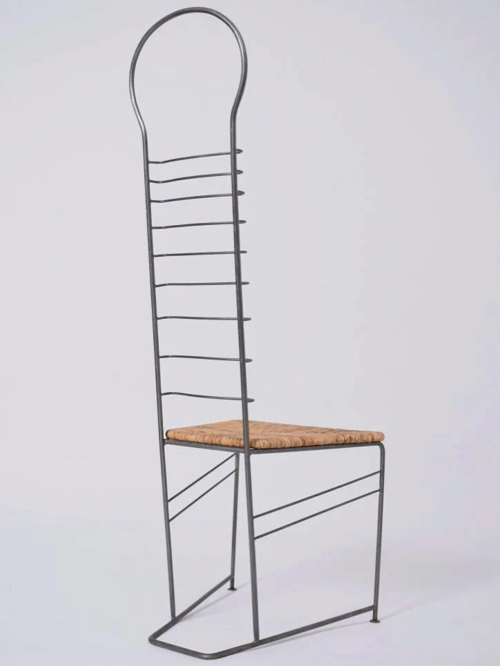 Pair of Iron And Straw Chairs, 1980s — side view highlighting iron frame and straw seat