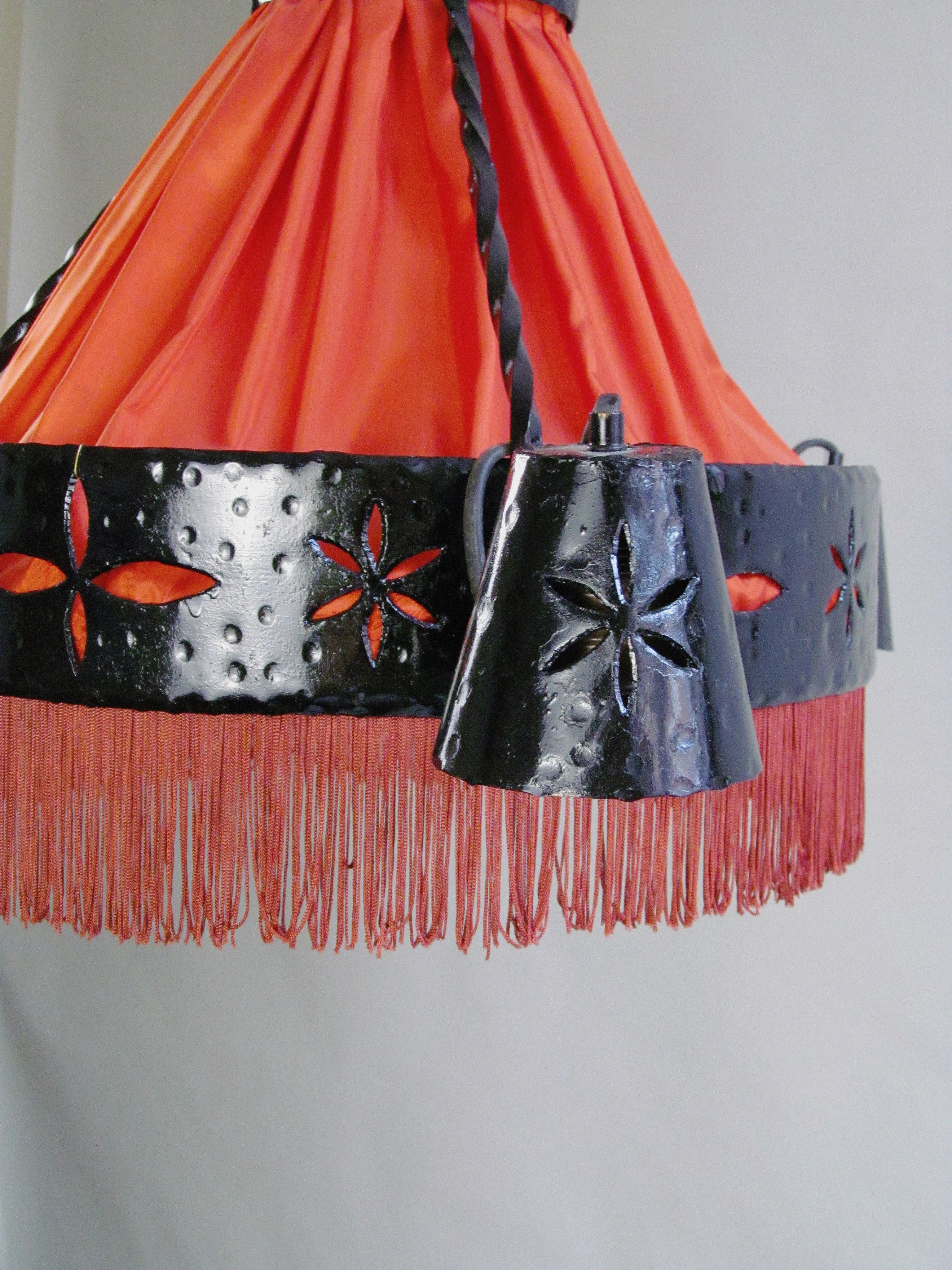 Art Nouveau Chandelier c.1900-1920 — close-up of black metal and orange fabric