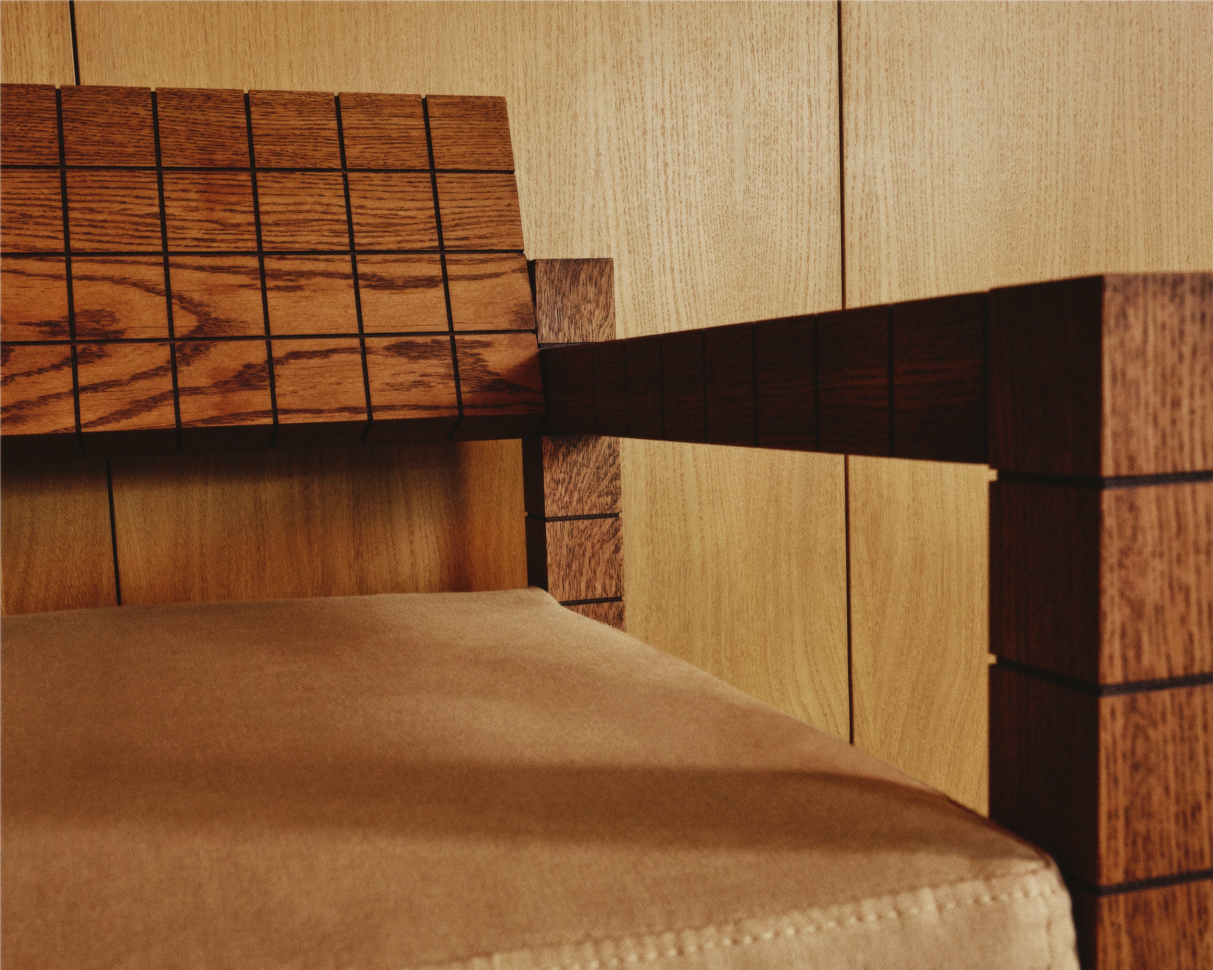 Mosaico Armchair — top view of wooden armrest and fabric seat