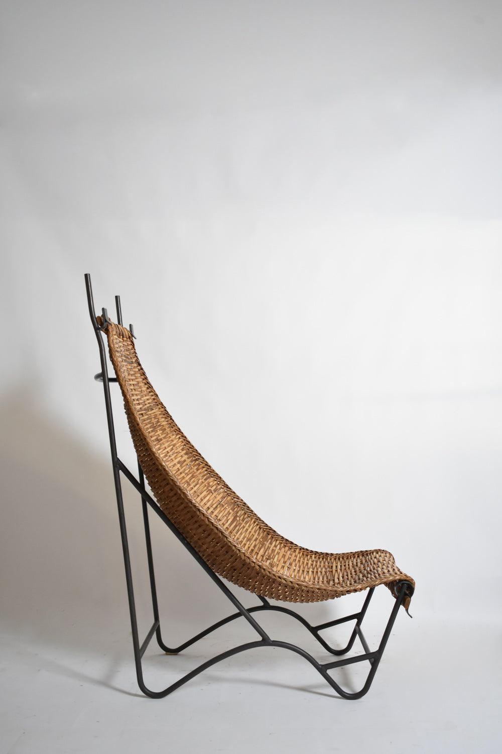 Wrought iron and rattan armchair, 1950s — lifestyle setting