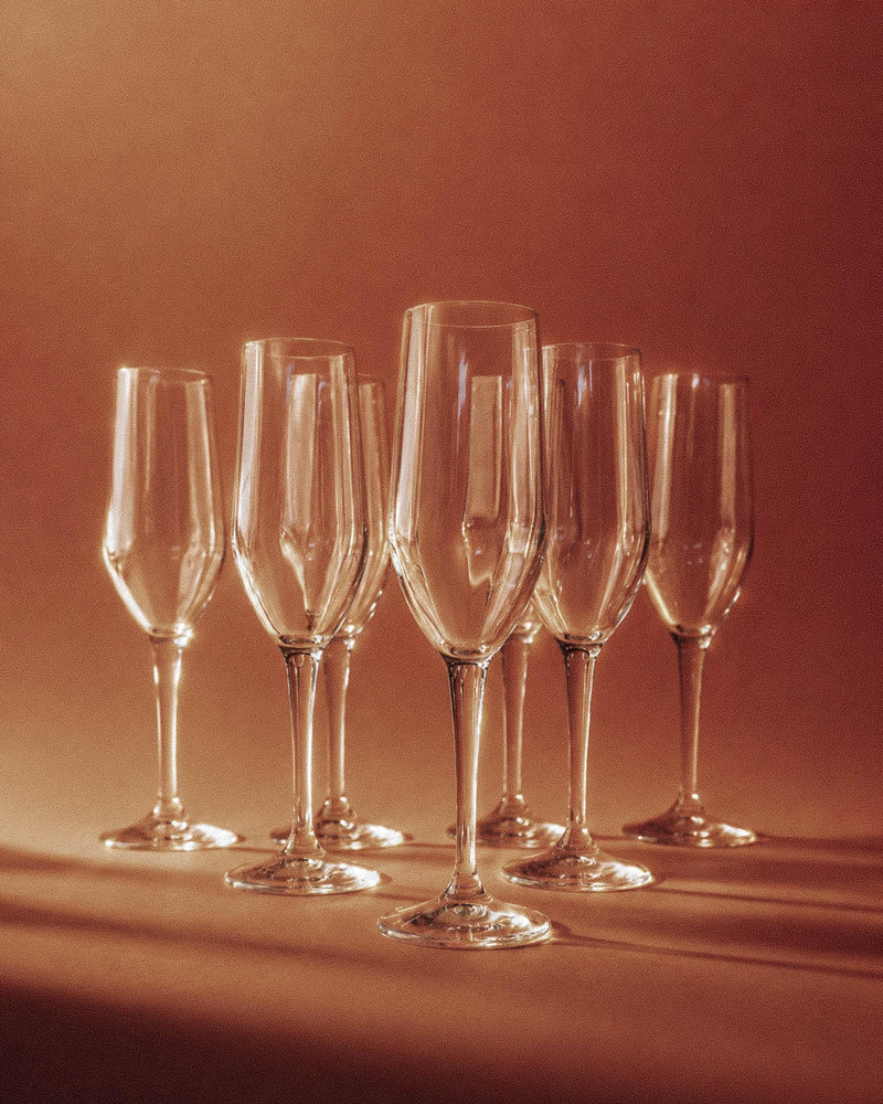 Vintage 1990s Champagne Glasses Set of 7, Clear Glass with Stem and Flute Shape, Elegant Timeless Barware, Retro Table Decor, Gift Idea by Bottega Jacobs