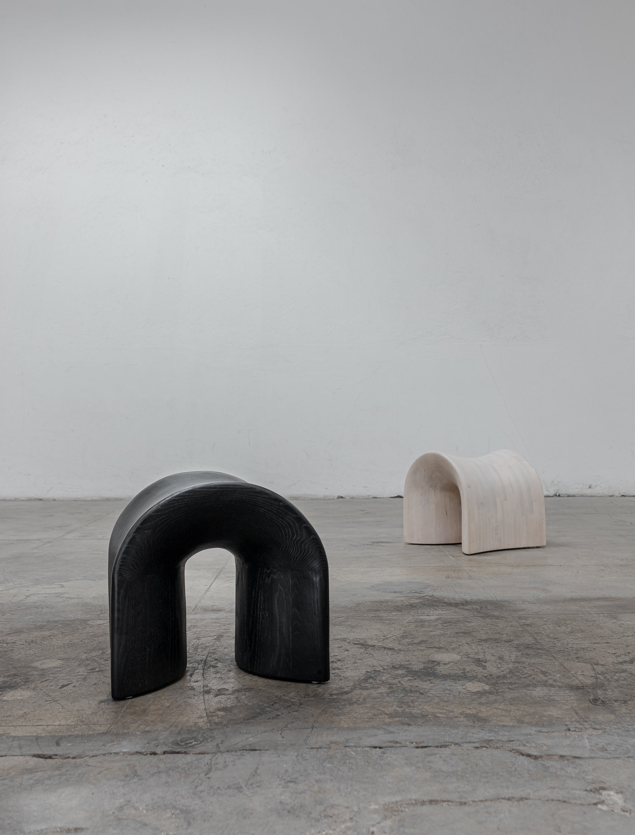 TORO Oak Stool — angled view of black and white oak stools