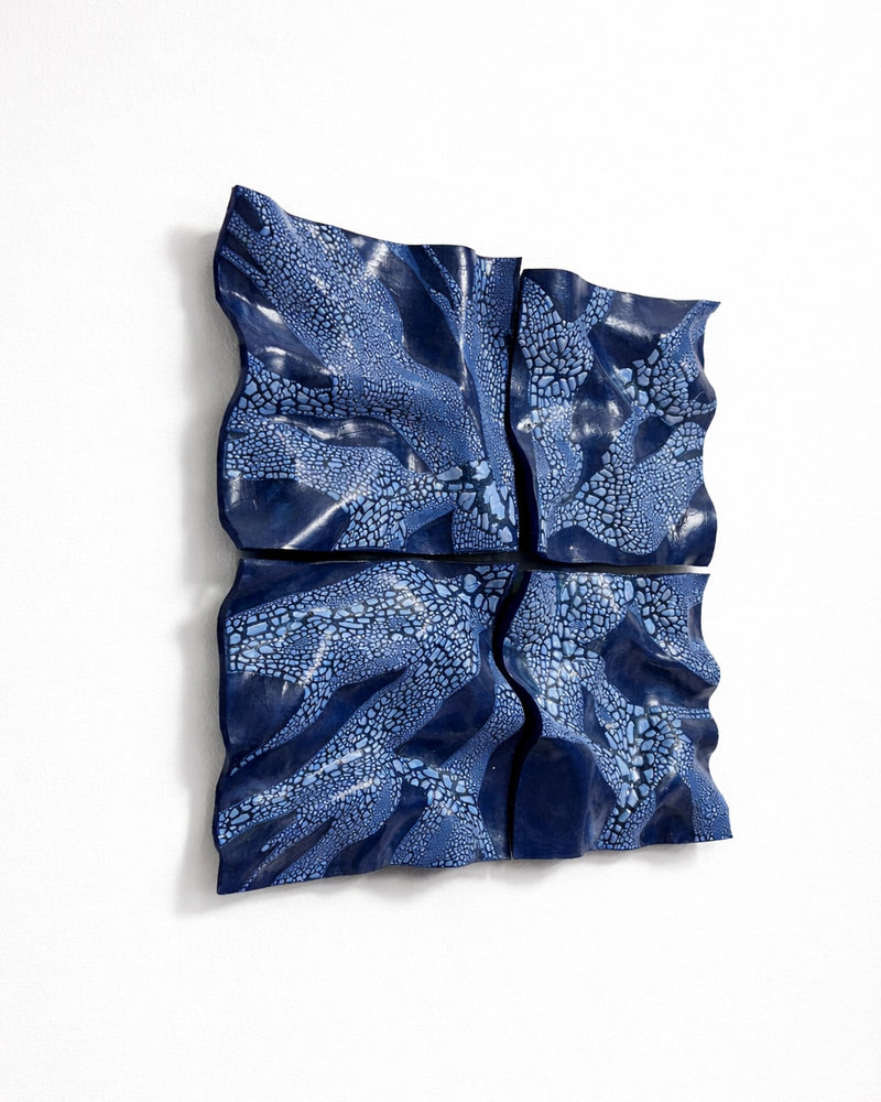 Blue ceramic Wall Sculpture — close-up of textured blue surface