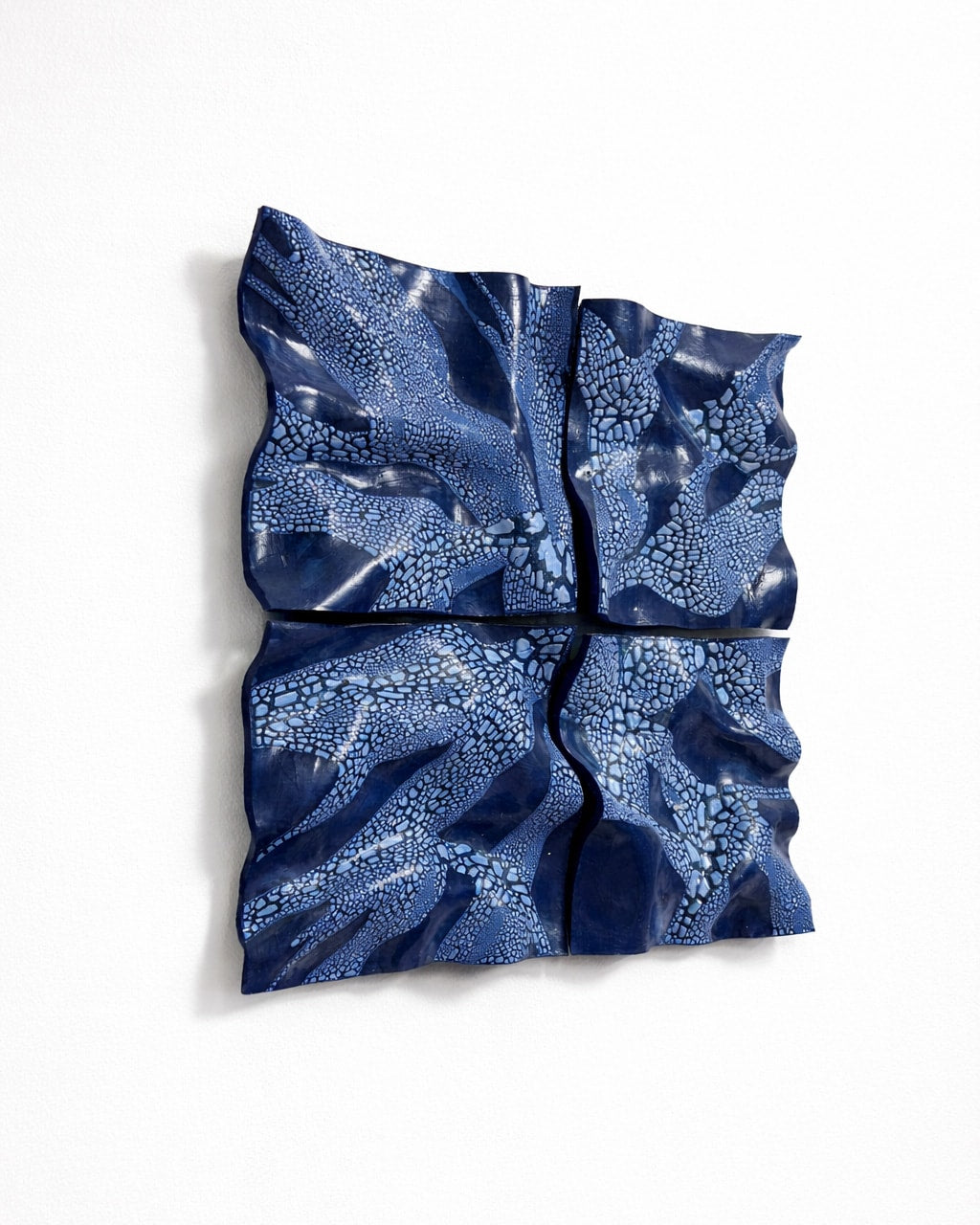 Blue ceramic Wall Sculpture — close-up of textured blue surface