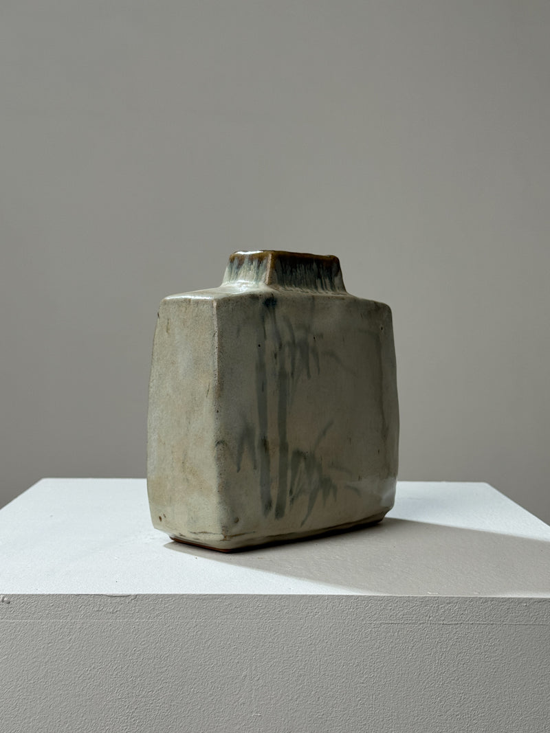 Square ceramic vase with sage green glaze and earth-tone rim