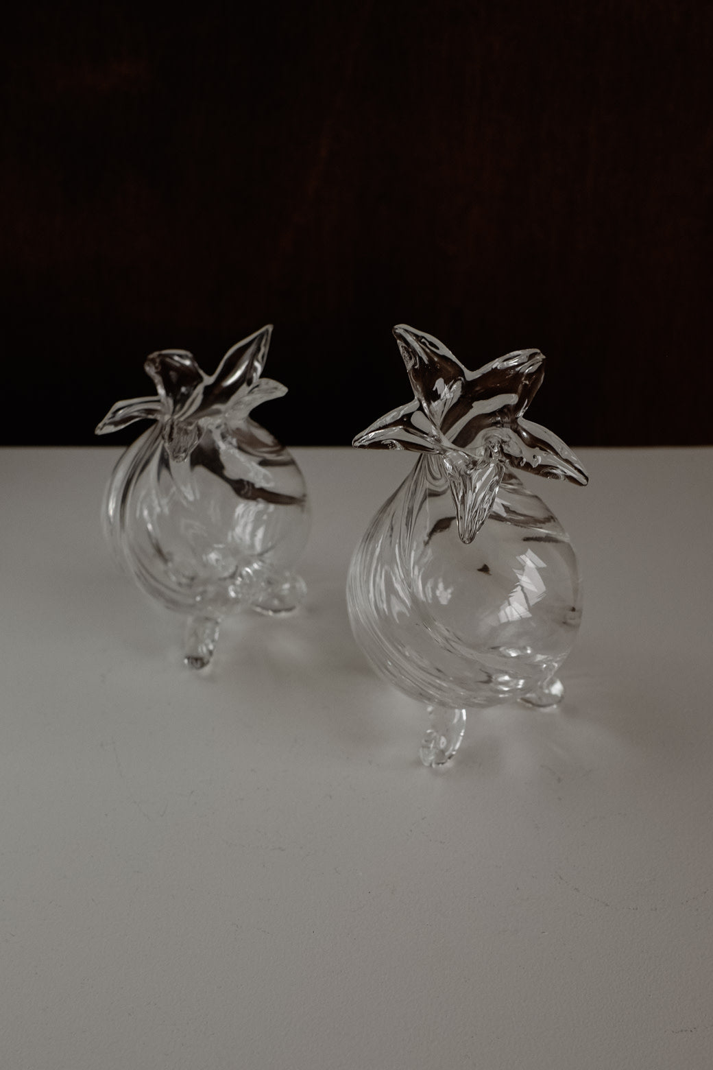 Mouthblown Glass Vase Set of 2 — close-up of clear glass with floral tops