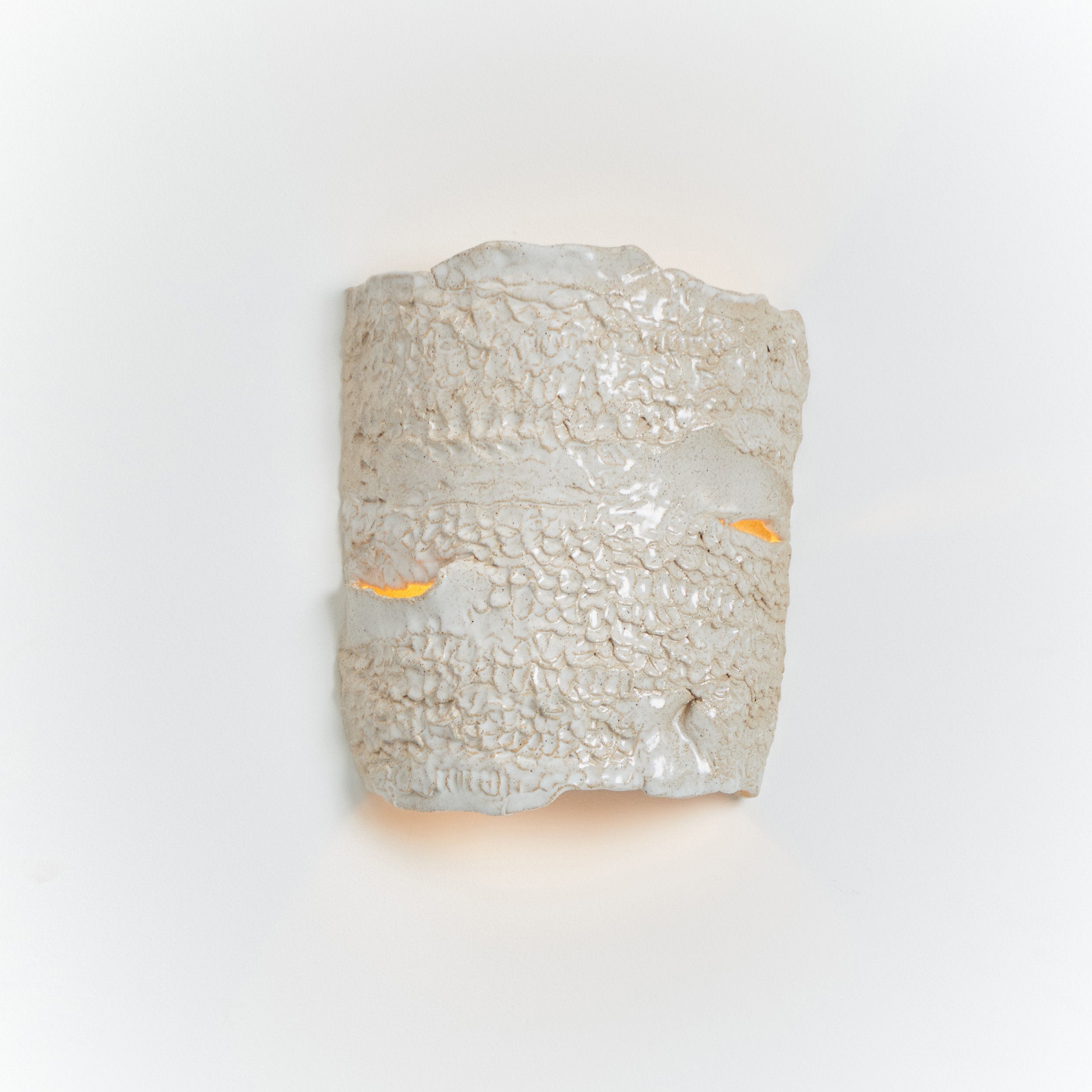 Casa Wall Light No3 by Project 213A | The Oblist — textured ceramic, warm glow