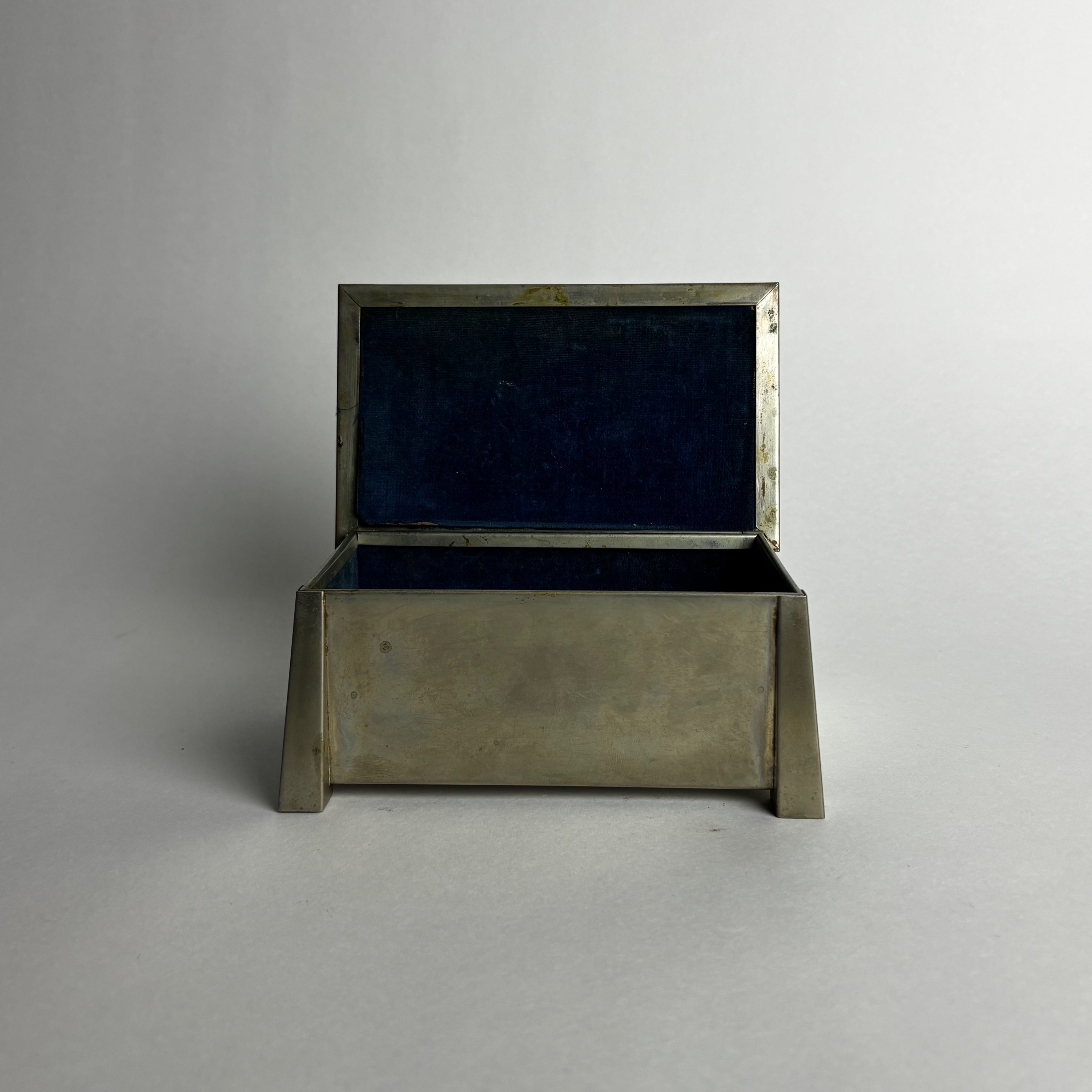 Vintage Boxes in Nickel - Lidded Cigarette Collection — in context