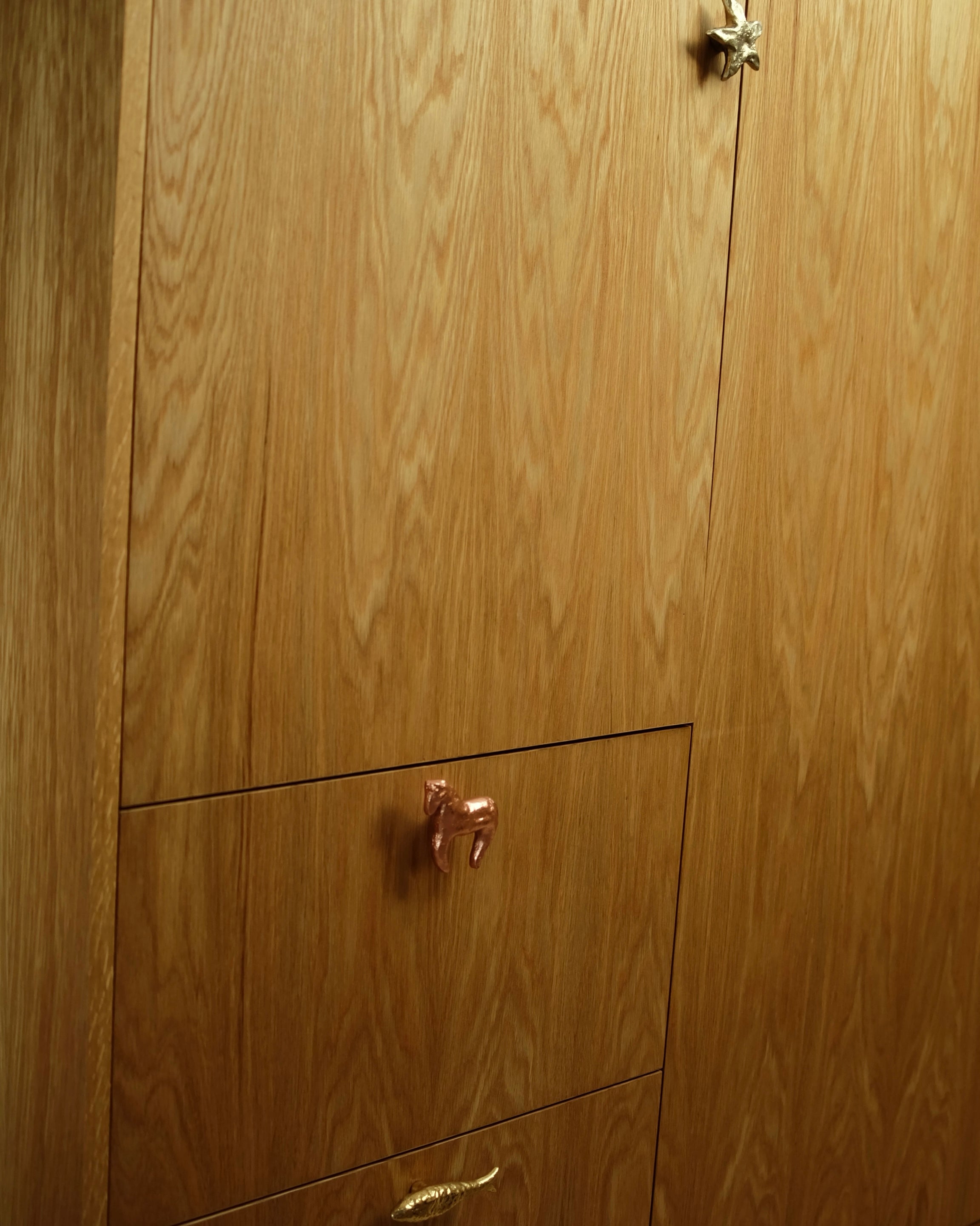 STAR Cabinet Knob/Wall Hook — side angle on wooden cabinet door