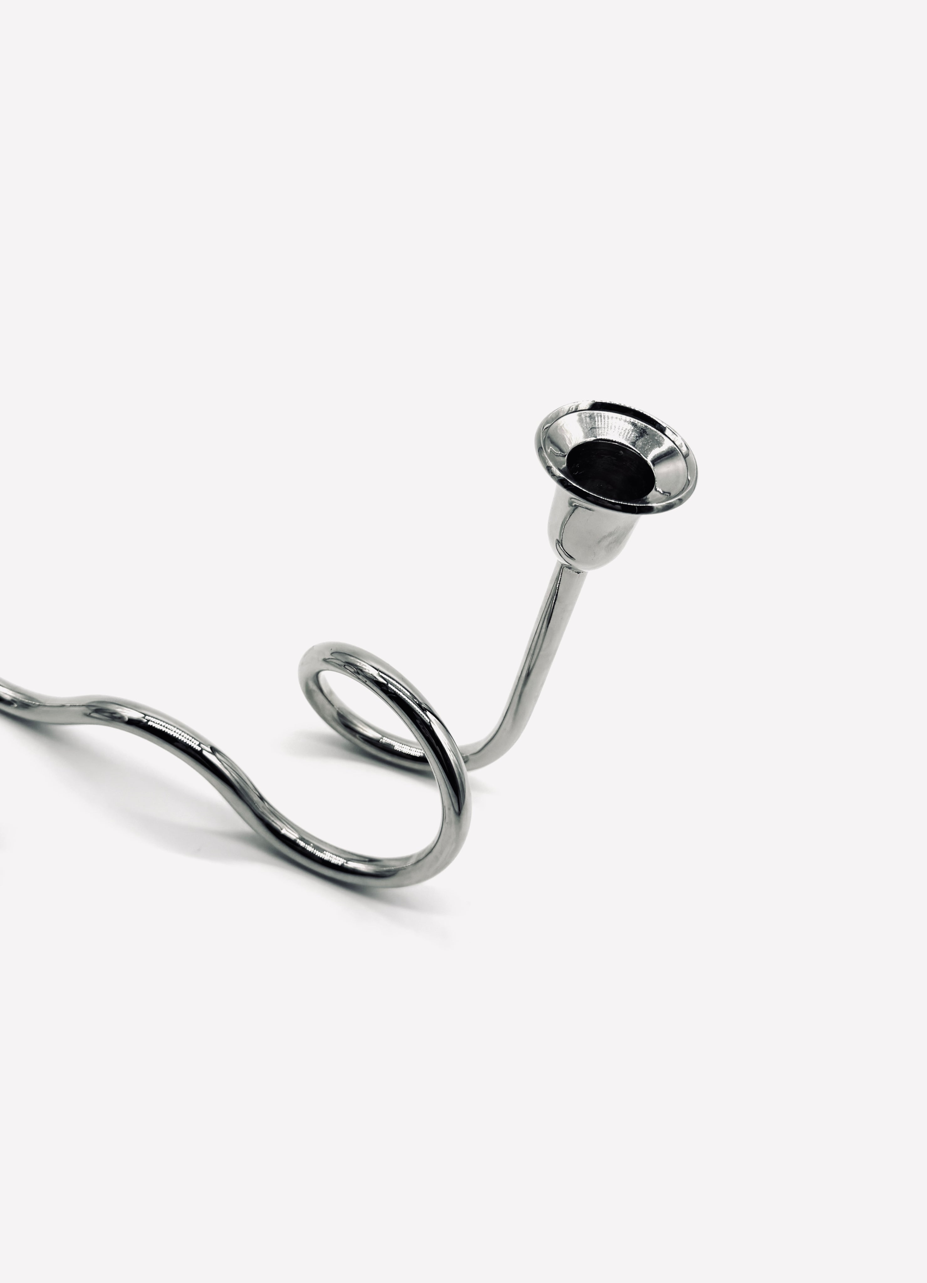 Italian candle holder in stainless steel — detail view