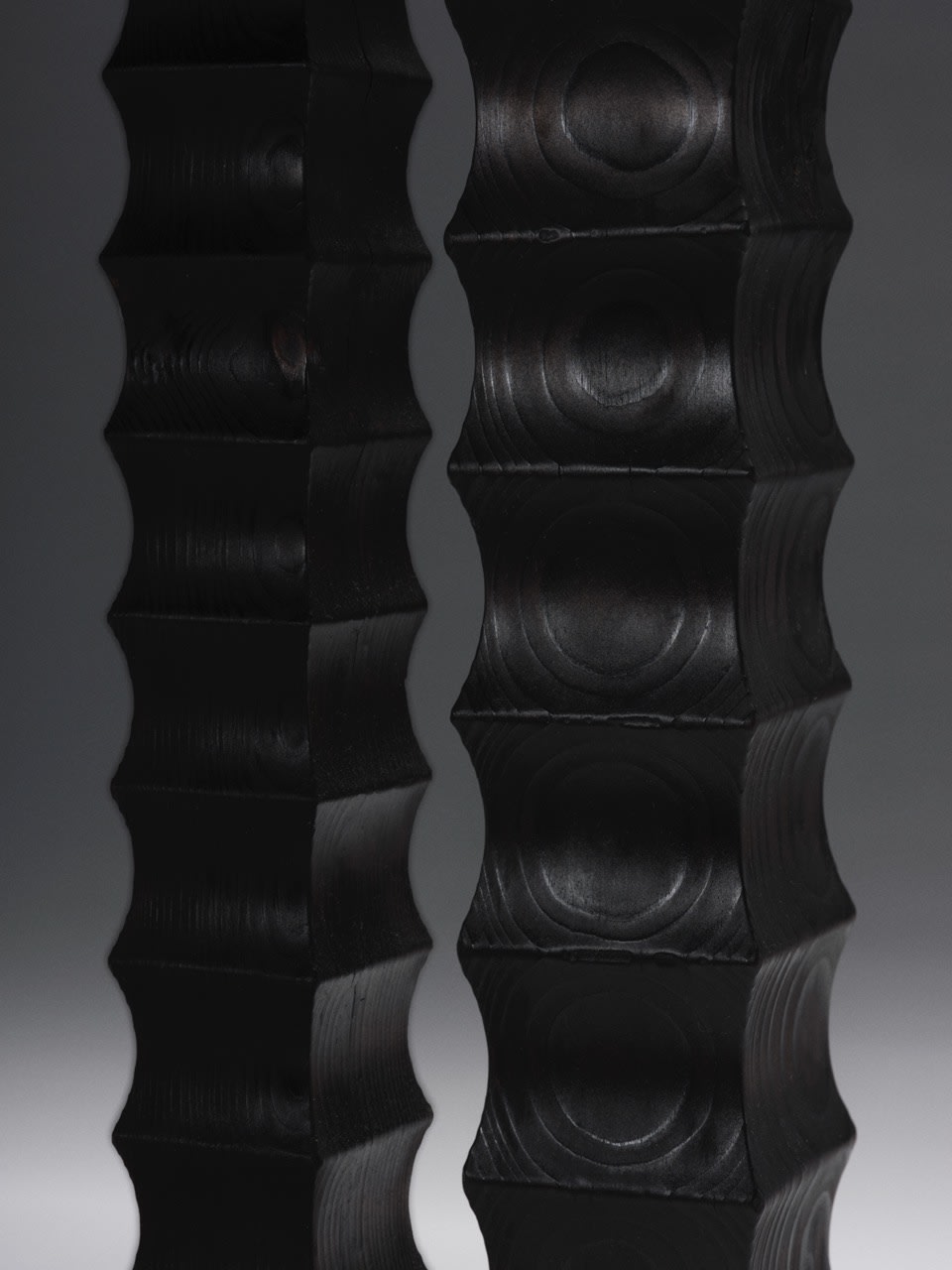 The Spiky Stool — side angle showing textured black surface