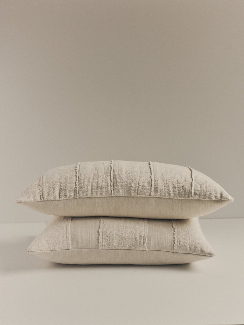 Handwoven white textured cushion by Elle La | The Oblist