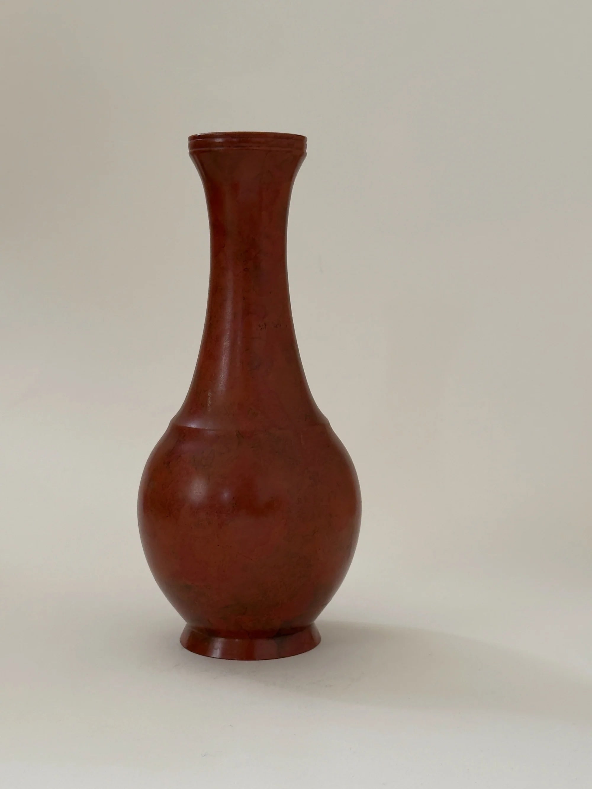 Japanese Bronze Vase with Mottled Vermilion Patina, Signed — close-up of smooth bronze surface