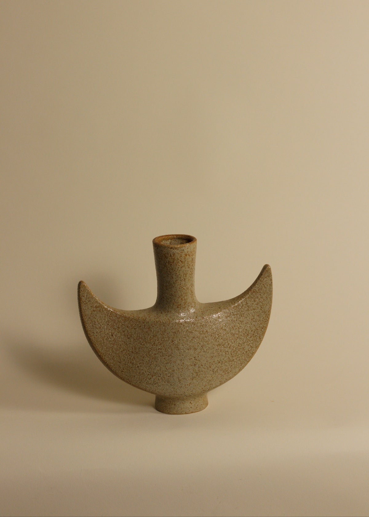 Sculptural Ceramic Vase by Toyo – Crescent Form with Original Label — lifestyle setting