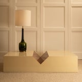 Wood lacquered coffee table - Italy — back view with lamp and wall paneling