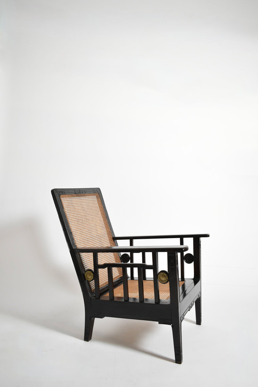 Pair of Colonial Ebonised Wood & Caning Armchairs, 1920s — lifestyle setting