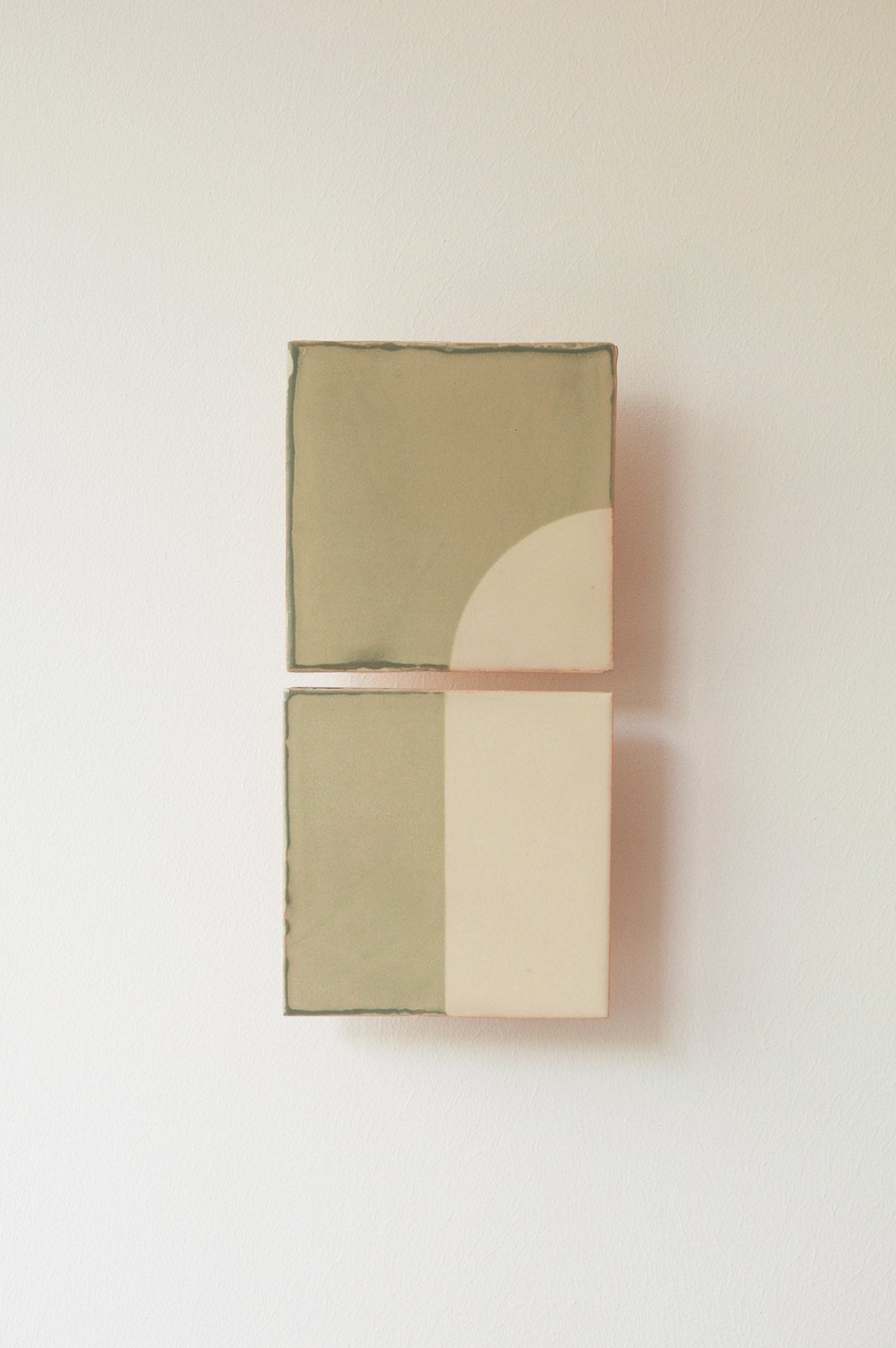 Minimalist artwork "Tiles Door V" by Violaine d'Harcourt features two stacked rectangles in beige and olive, perfect for artisan home décor. Its design evokes the handcrafted charm of Portugal, adding an elegant touch to any space.