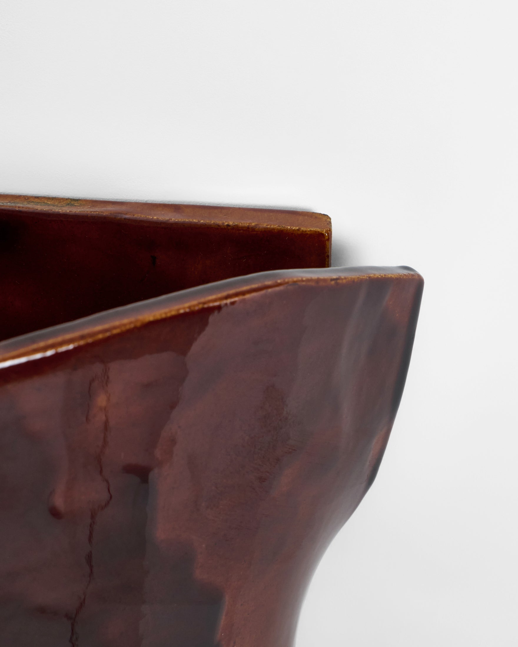 Papel Wall Light — back view highlighting rich brown ceramic finish