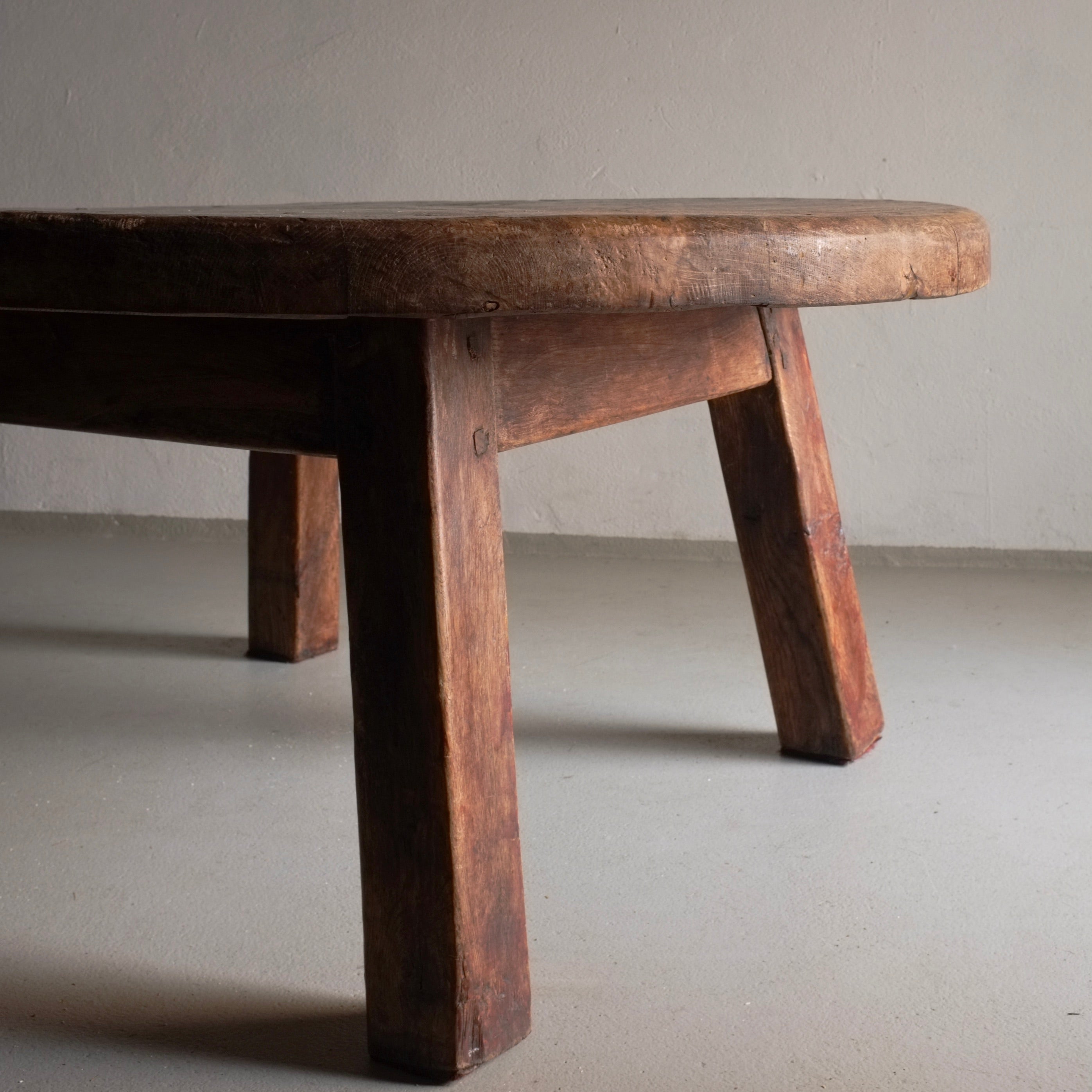 Brutalist Oak Round Coffee Table | Belgium | 1950s — angled view highlighting sturdy wooden legs