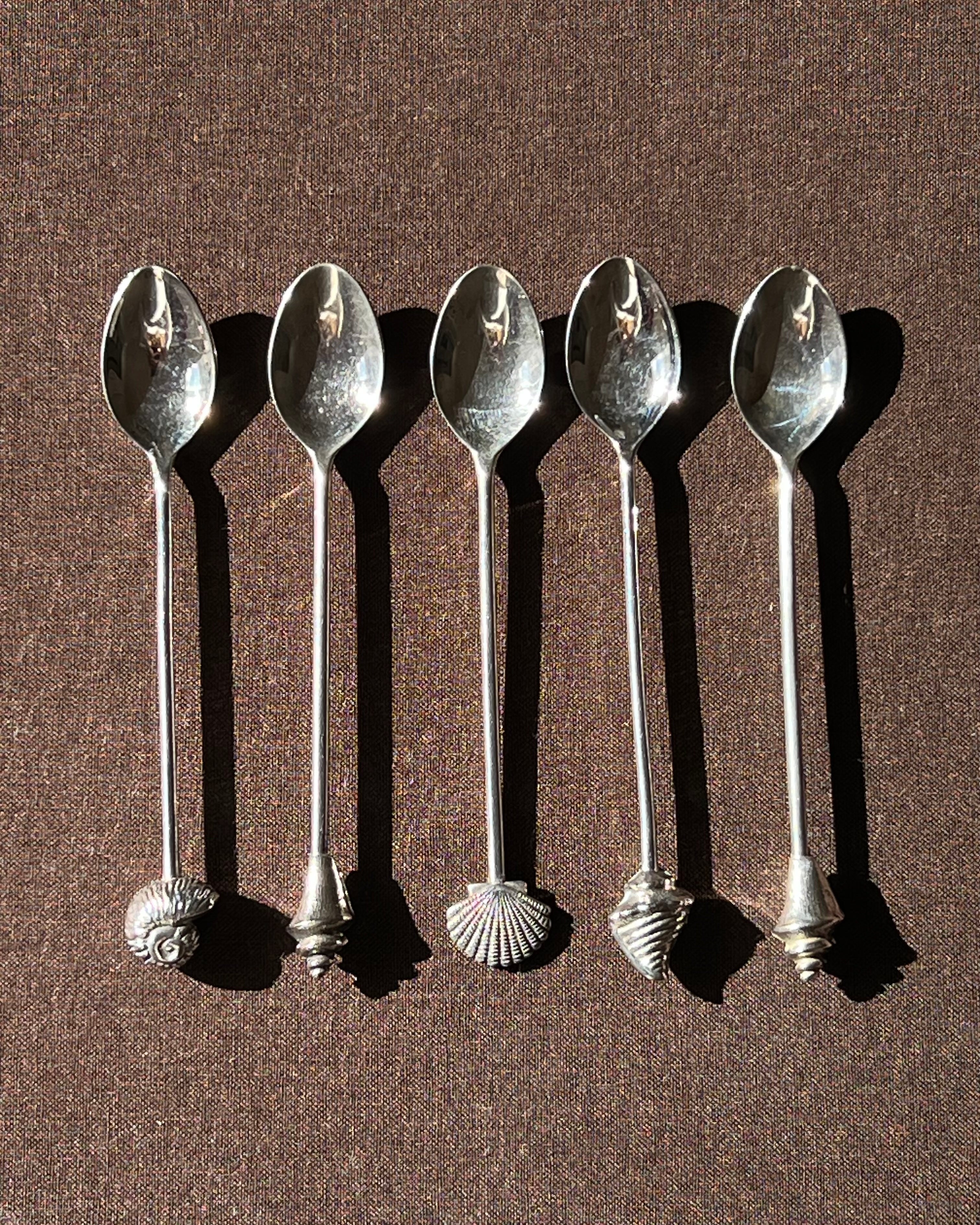 Silver Plated Shell Dessert Spoons — detail view