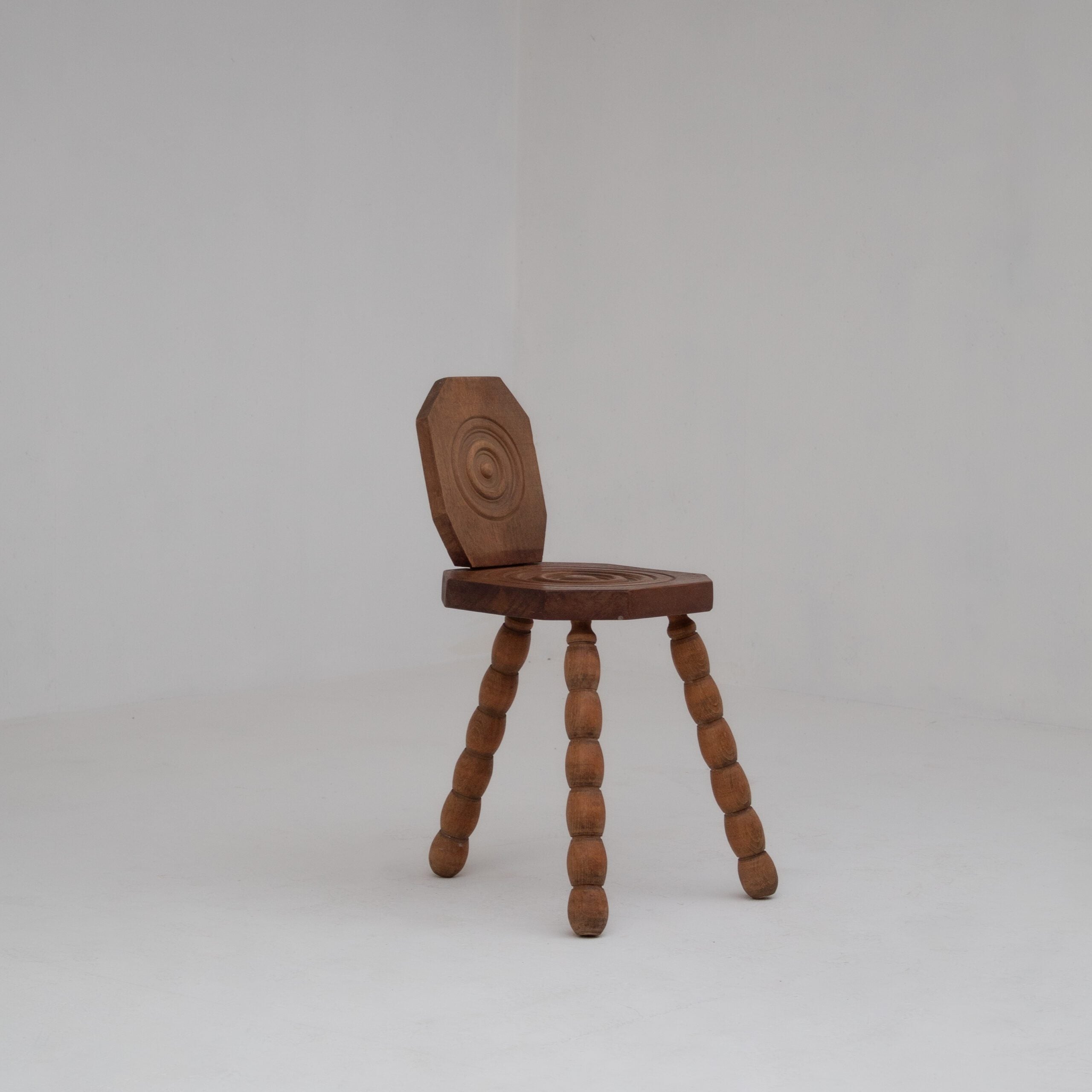 Pair of Sculptural Bobbin Stools with Backrests — in context