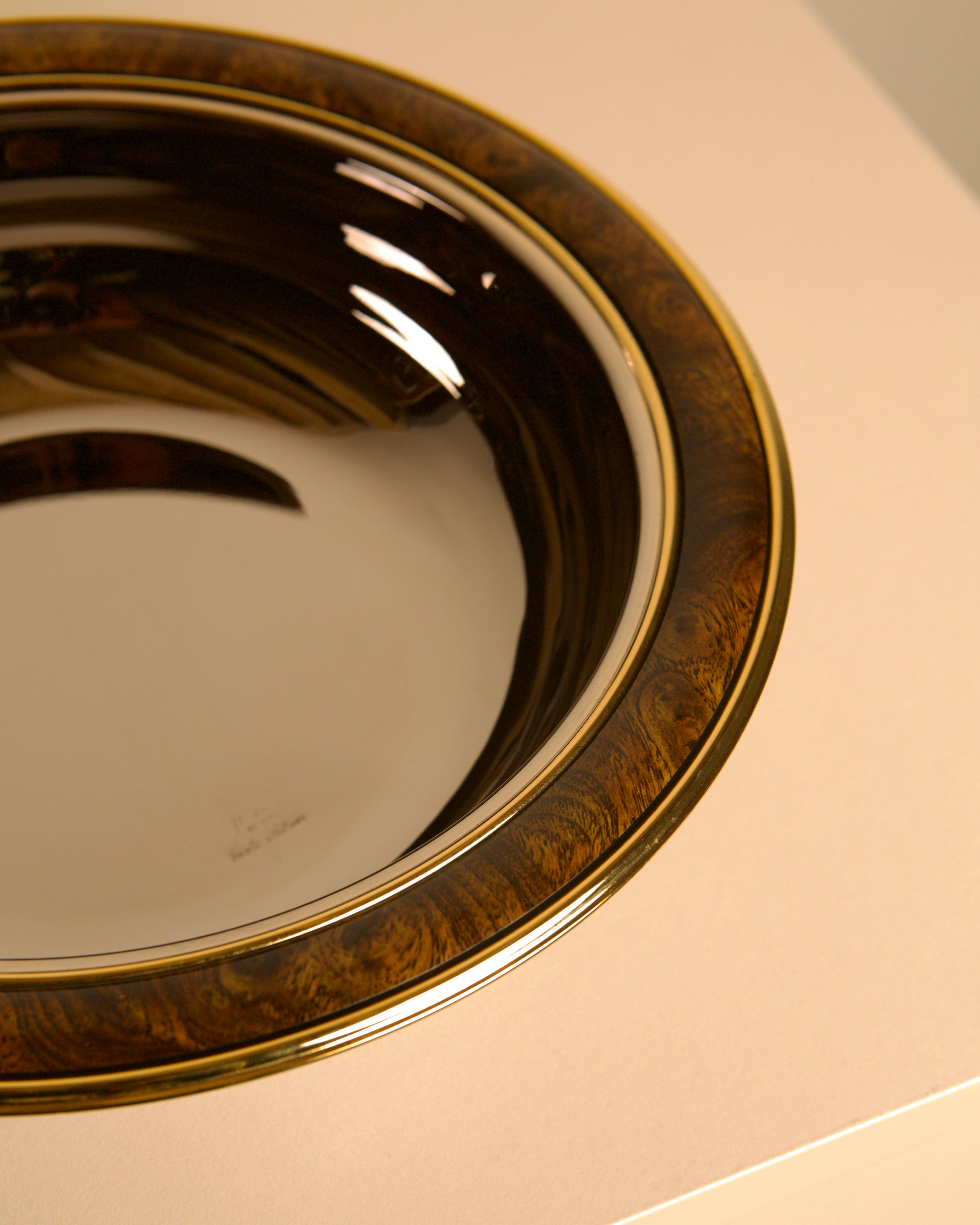 Italian circular silver-plated and wood-effect metal vide-poche from the 70s — lifestyle setting