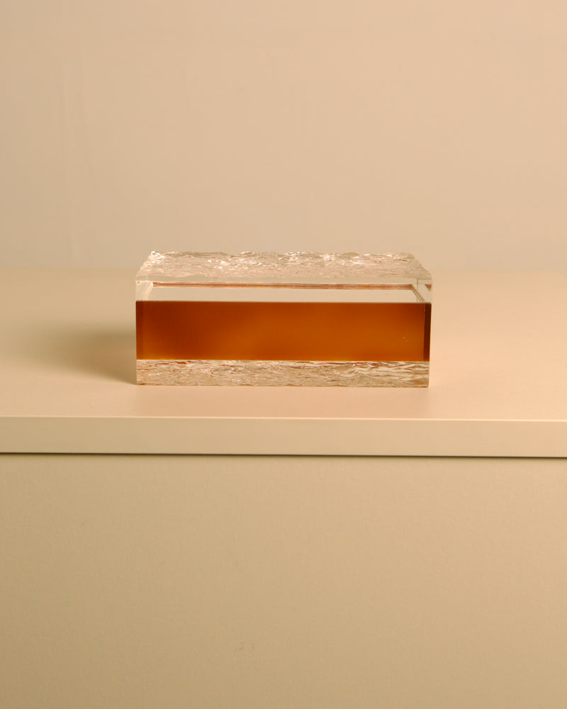 Italian Box in Smoked Plexiglass — close-up of textured surface on white table
