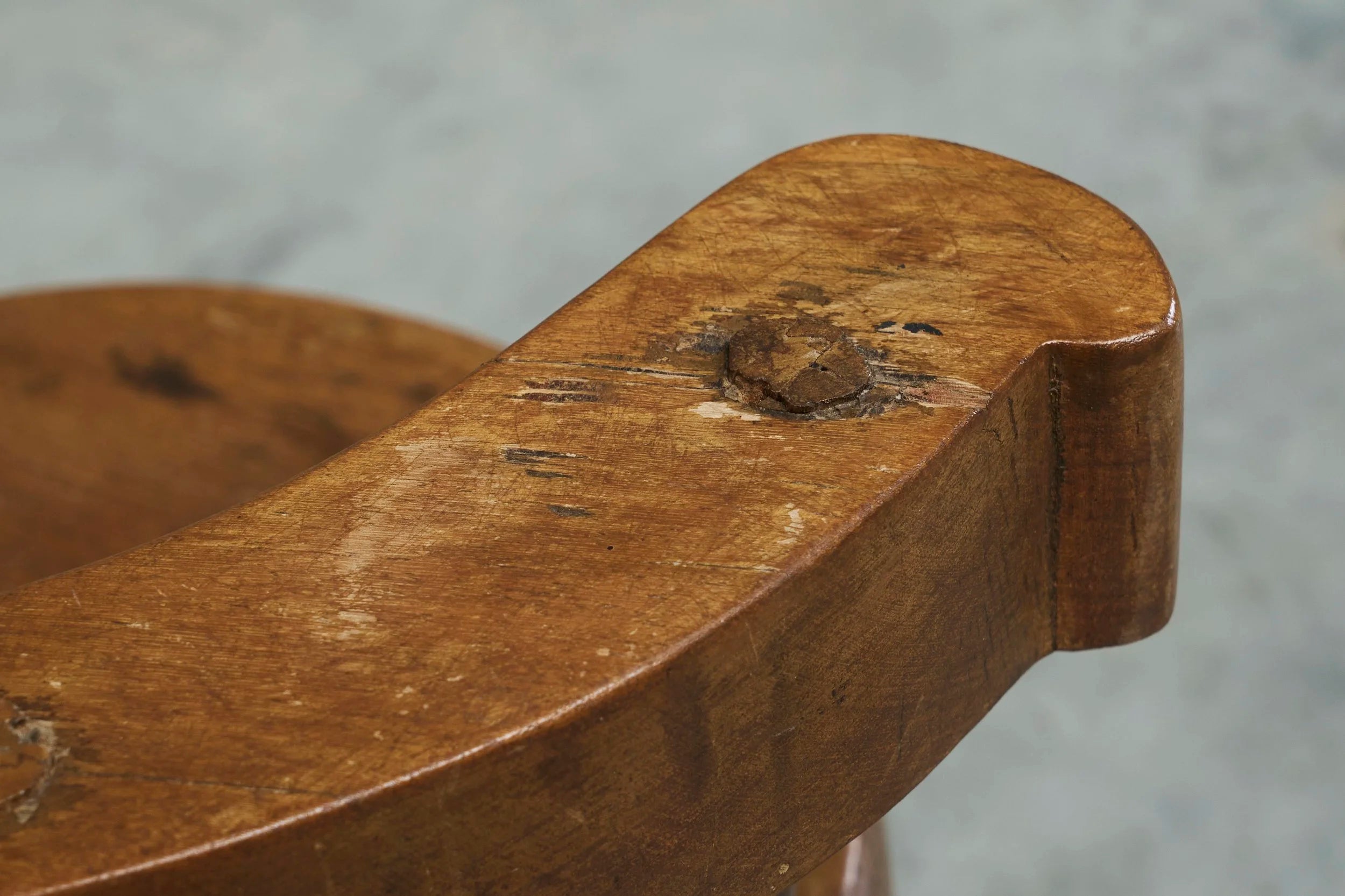 A Sculptural Three-Legged Provincial Vernacular Chair in Heavy Solid Oak France Early 20th Century — in context