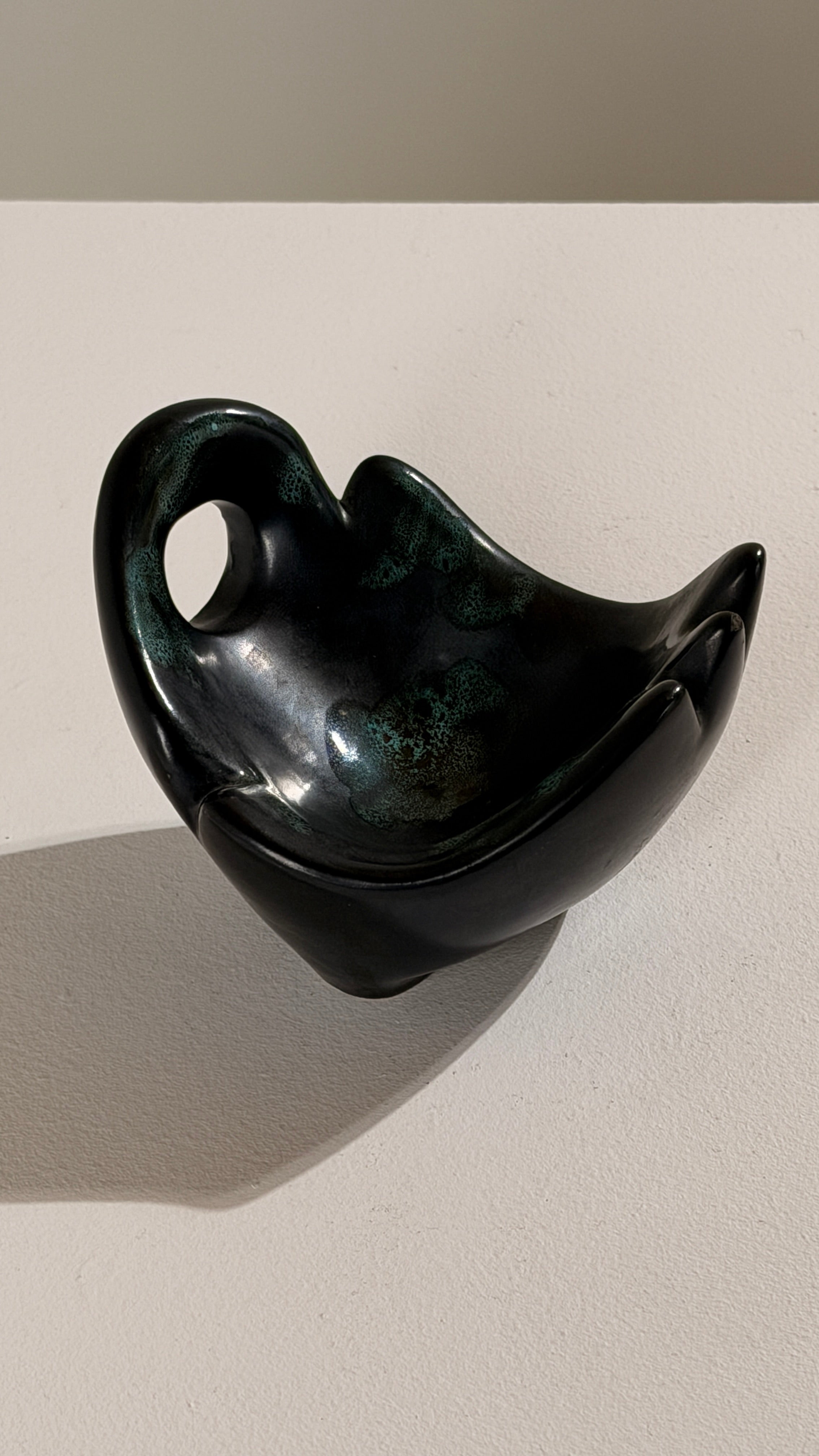 Free-form Ceramic Bowl, Vallauris, France, circa 1960 — side angle showing dark ceramic finish