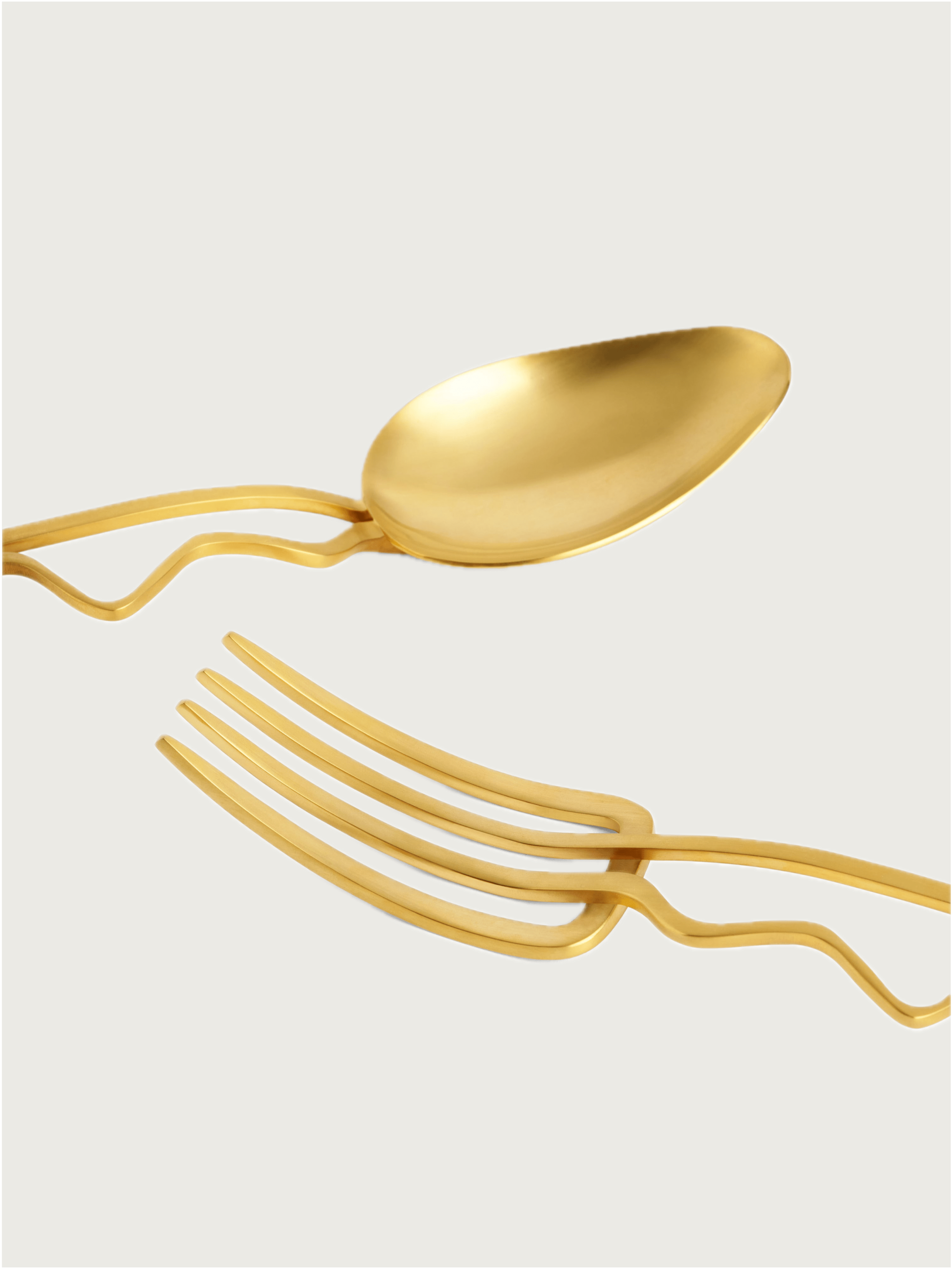 Spirale Serving Set of 2 — top view of gold serving spoon and fork