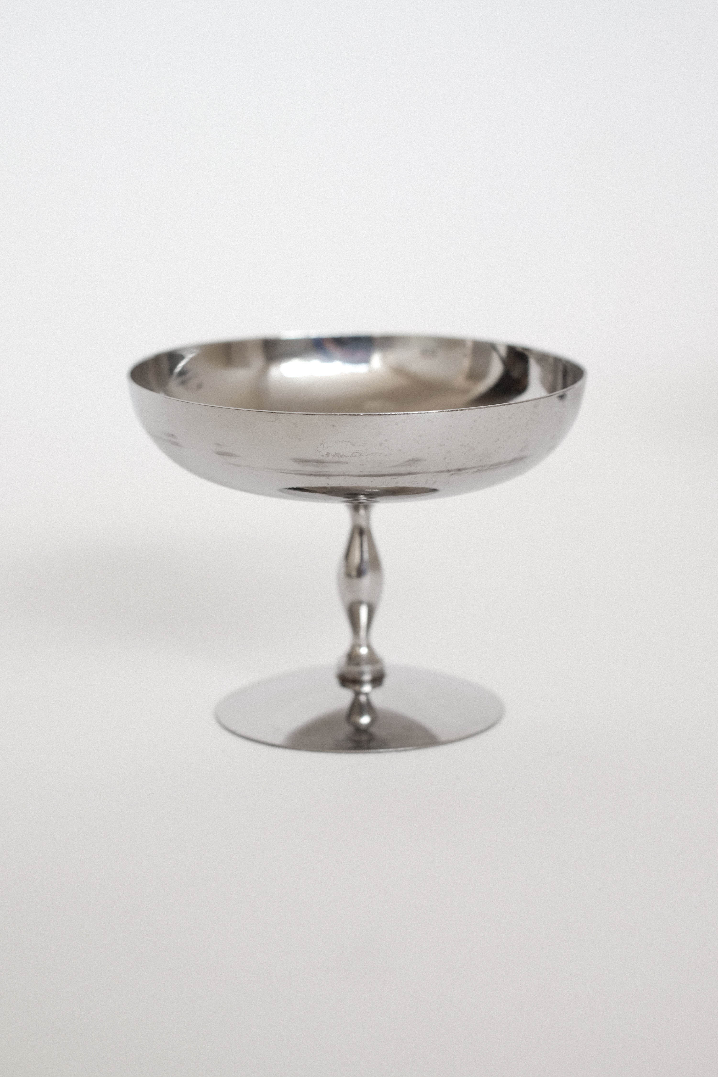 Set of 6 Ice Coupes — close-up of polished metal surface