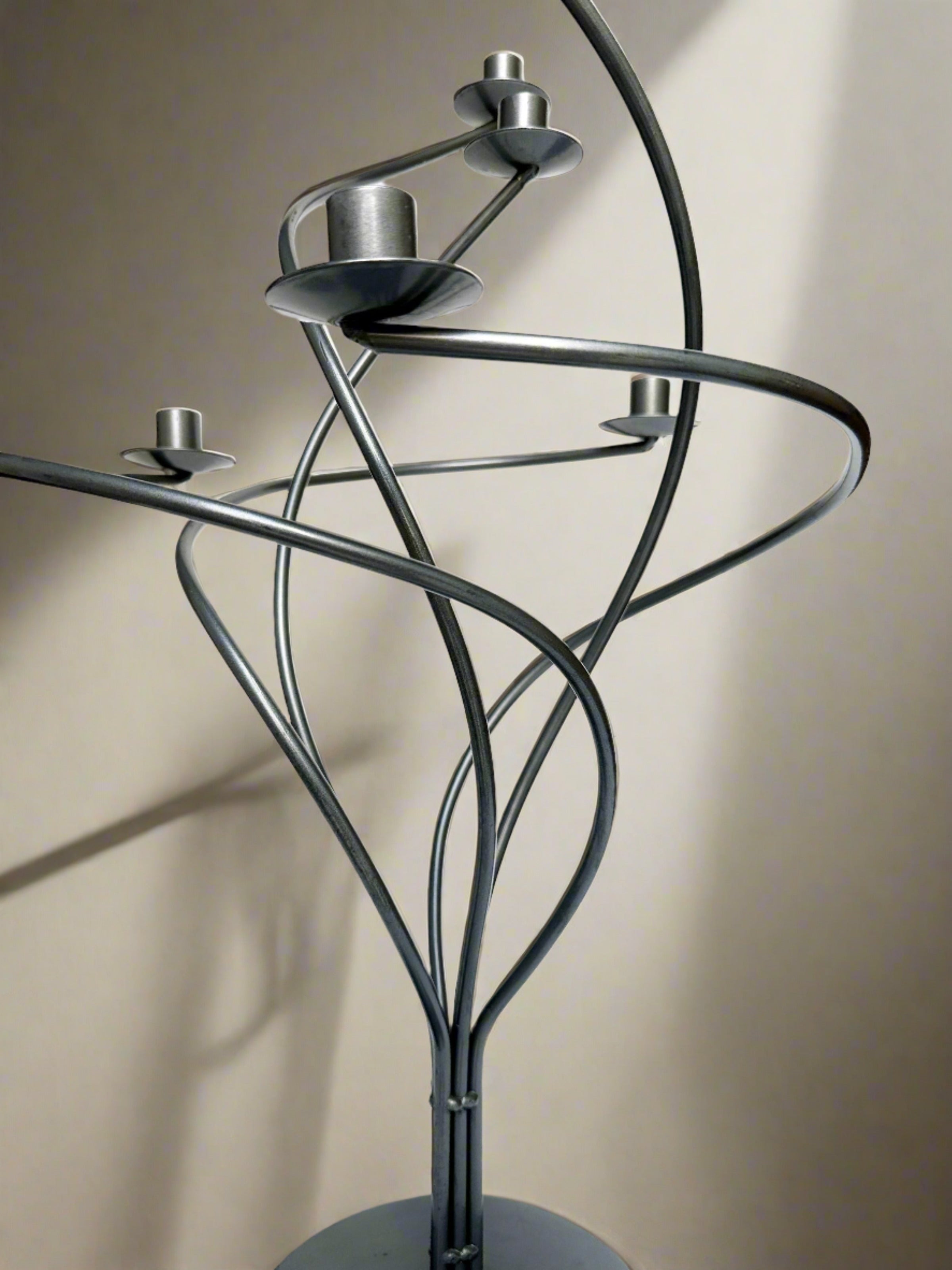 Large Spiral metal Candelabra — side angle showing twisted metal design