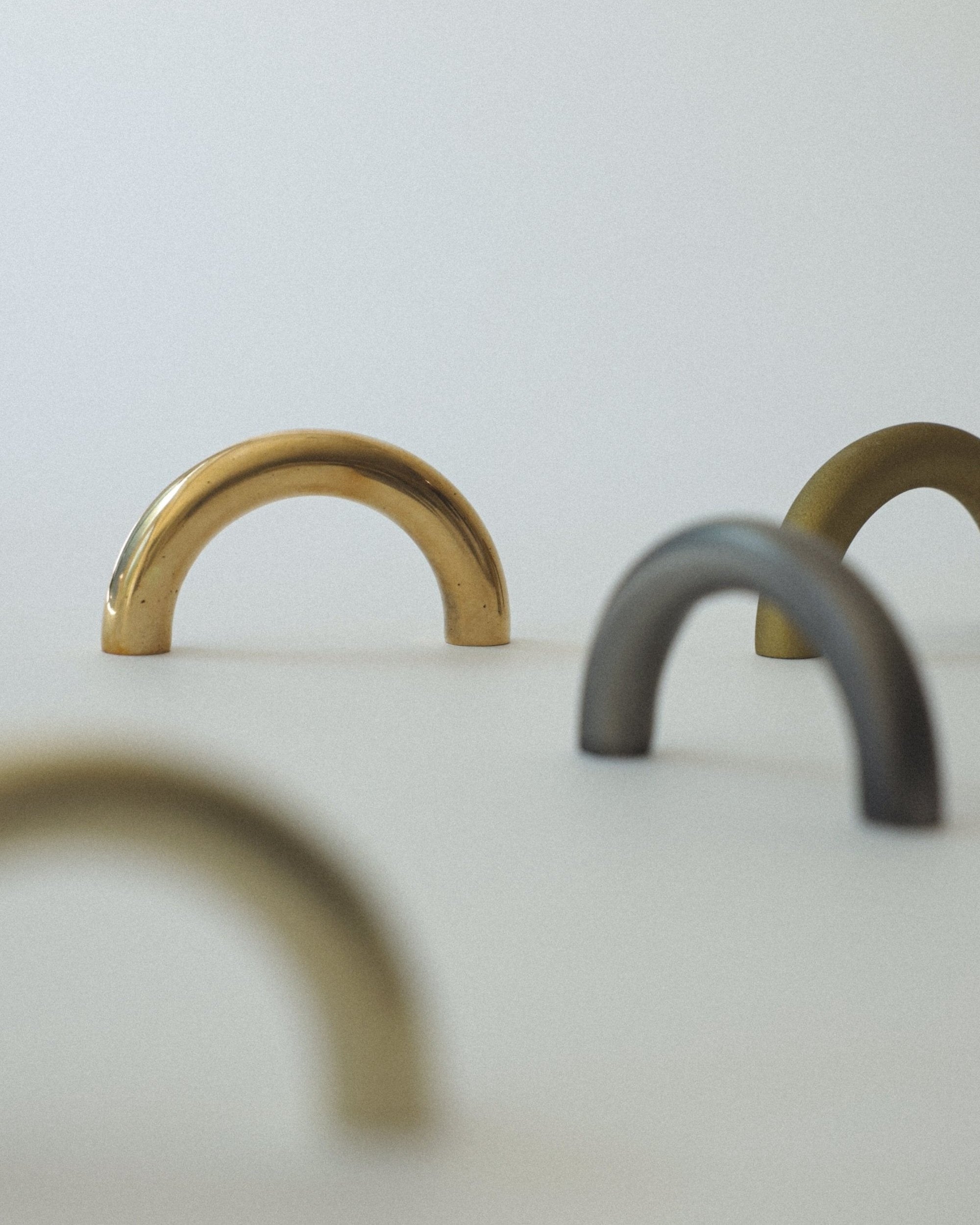 CERCLE Cabinet Pull Thin (2 sizes) — top view of brass and matte finishes